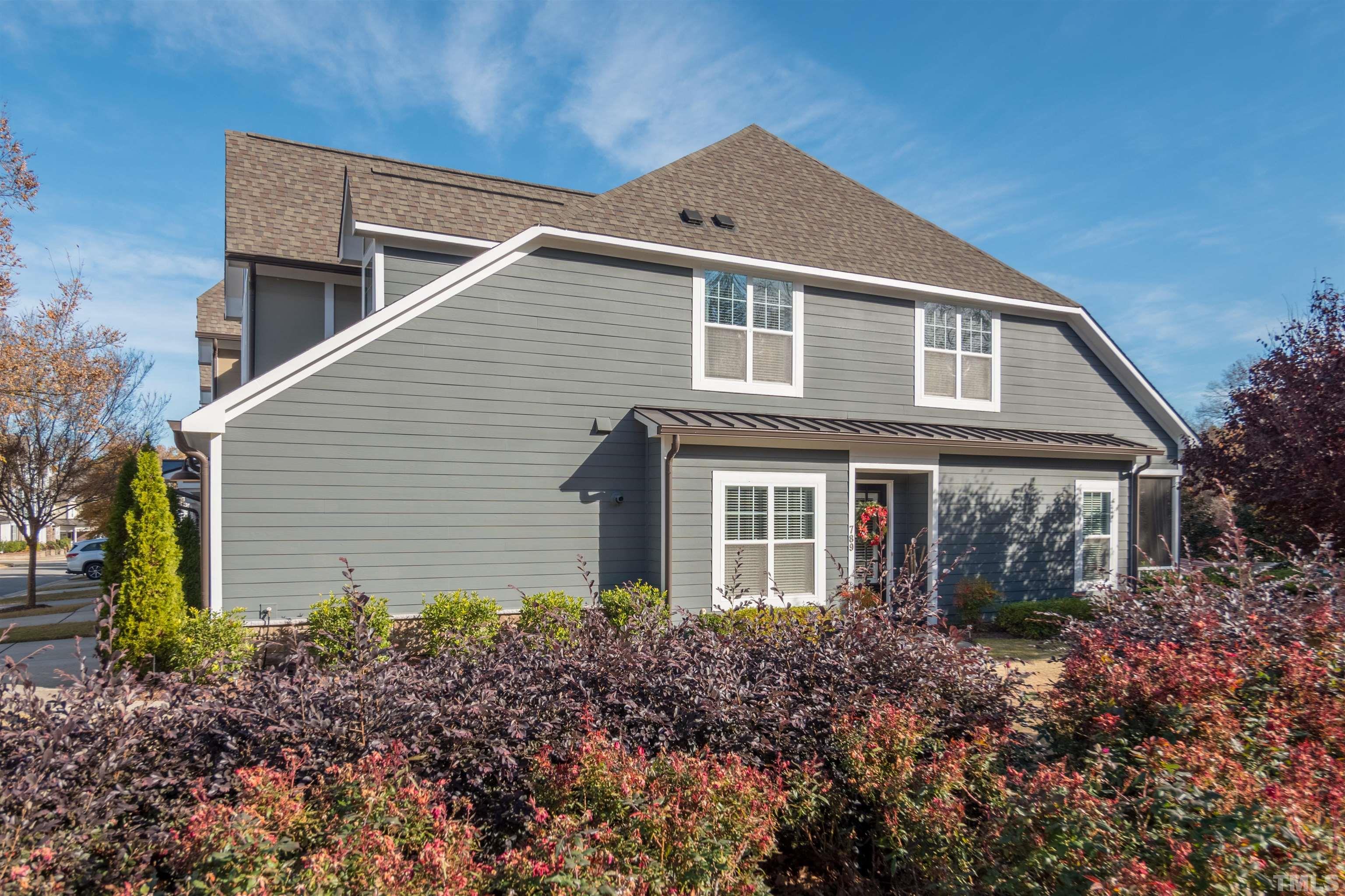 789 Fallon Grove Way Raleigh, NC 27608 - Photo 28 of 29 a front view of a house with garden