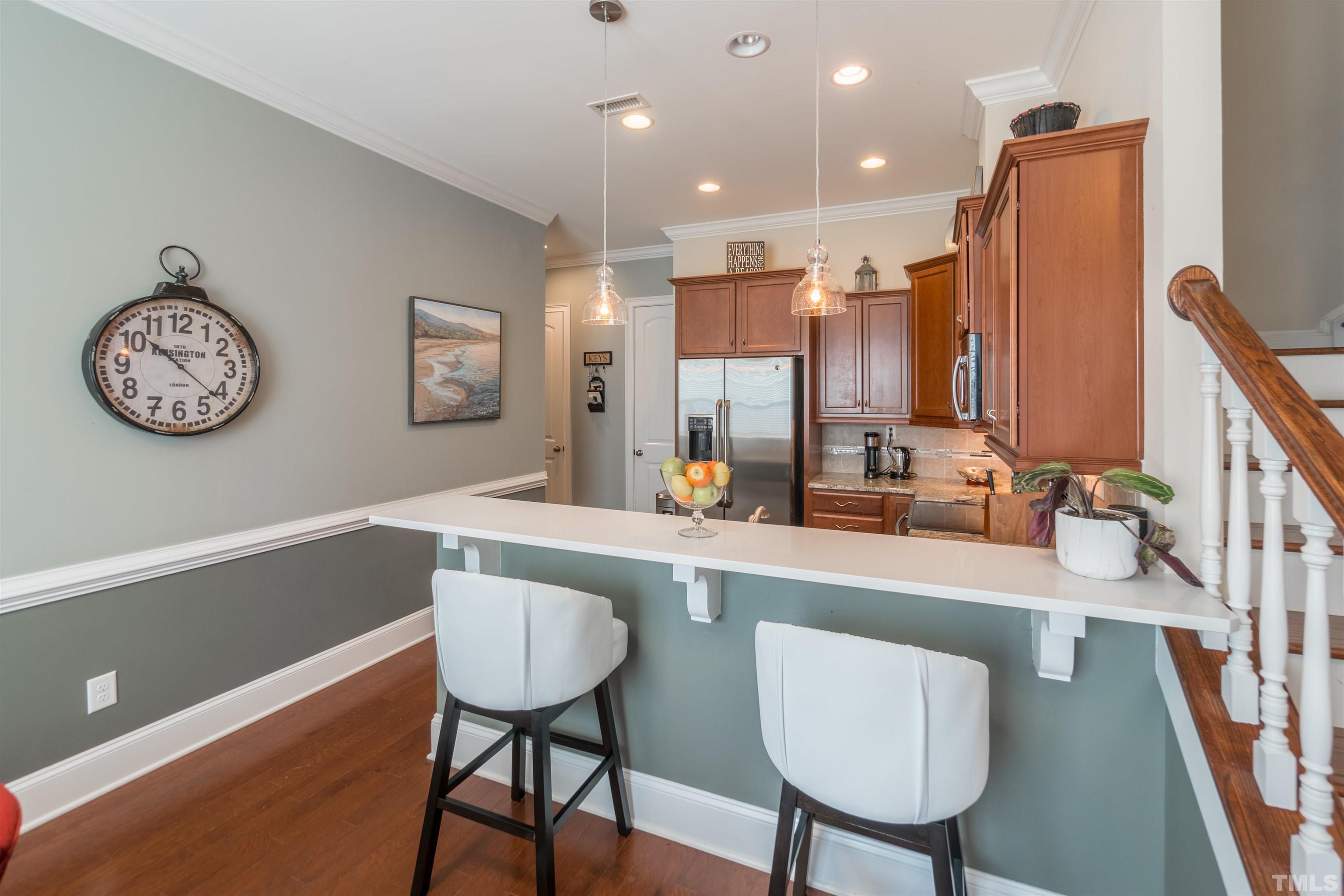 789 Fallon Grove Way Raleigh, NC 27608 - Photo 8 of 29 a bathroom with a sink a mirror and a bath tub
