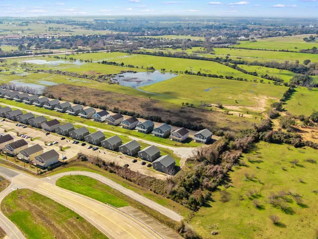 a view of a city with an ocean view