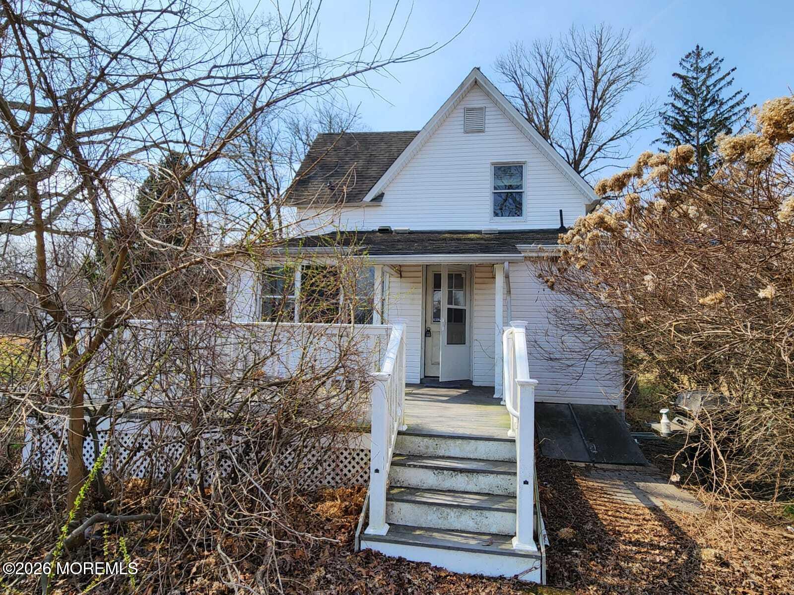 175 Grawtown Road Jackson, NJ 08527 - Photo 7 of 27 a front view of house with a garden