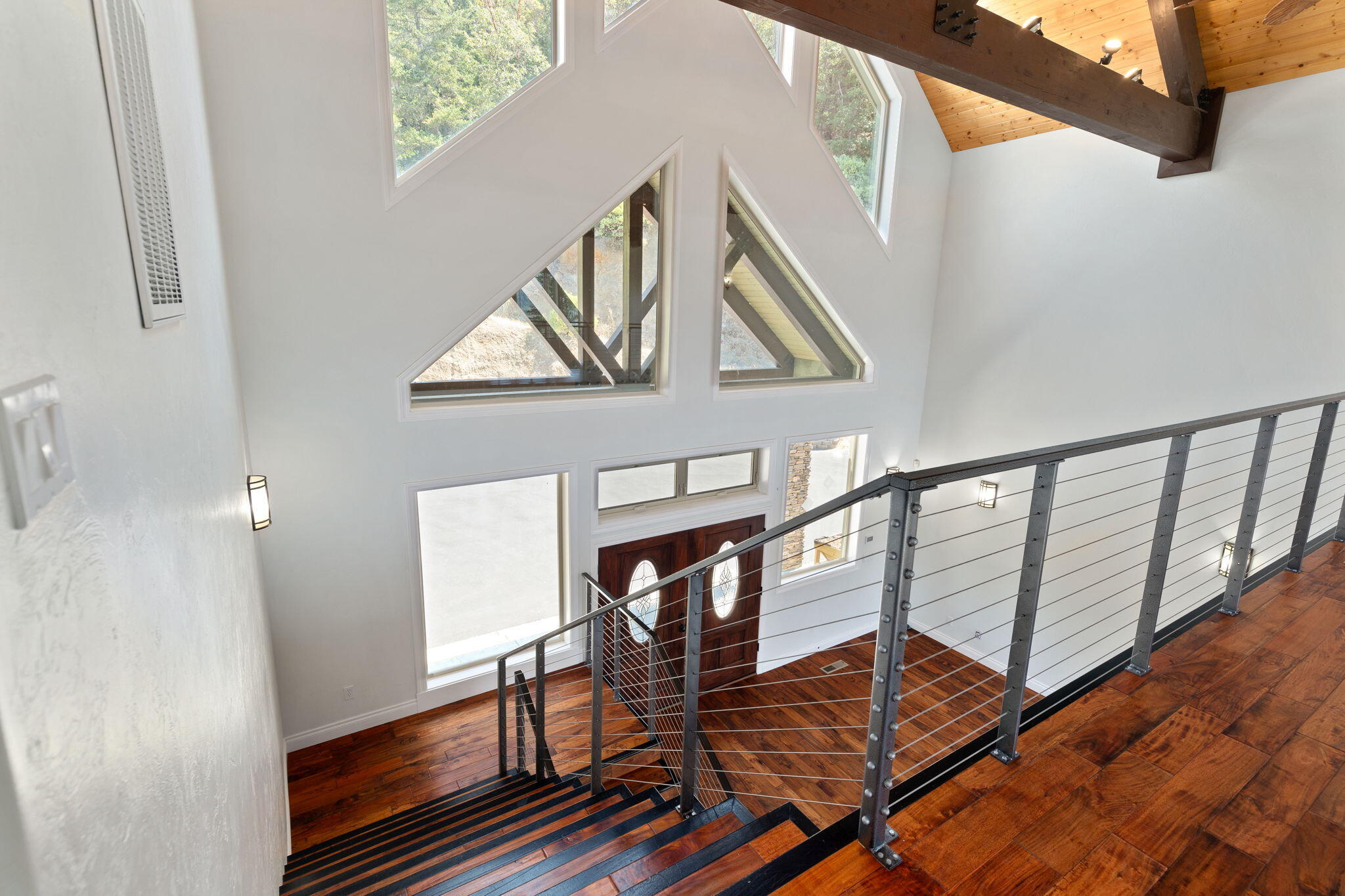7304 North Applegate Road Grants Pass, OR 97527 - Photo 38 of 87 a view of entryway wooden floor and front door