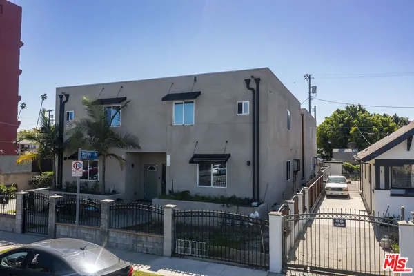 a front view of a house with balcony