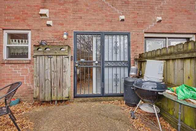 a view of balcony with furniture