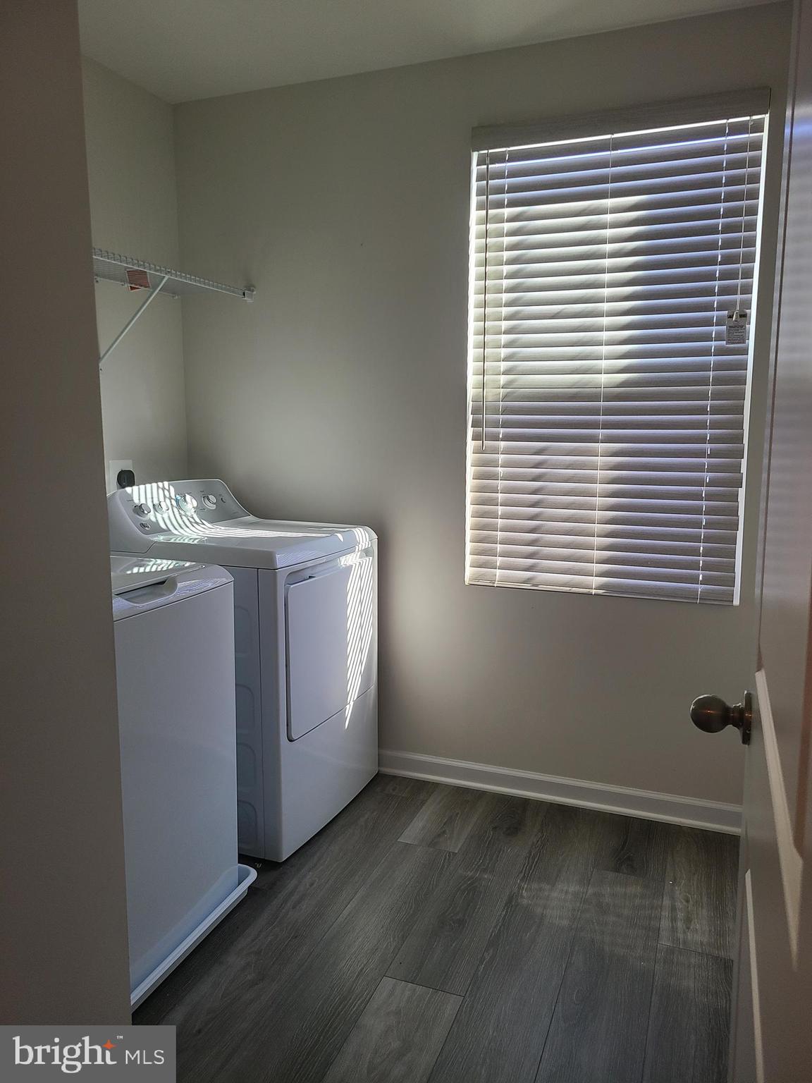 105 Mariners Way Cambridge, MD 21613 - Photo 11 of 45 a utility room with dryer and washer