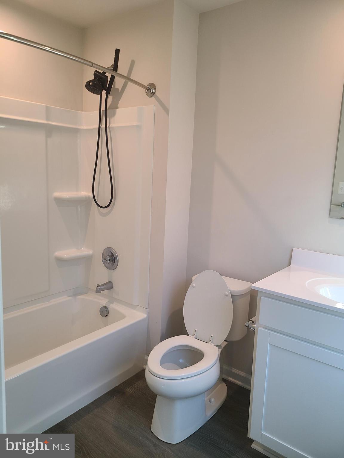 105 Mariners Way Cambridge, MD 21613 - Photo 21 of 45 a bathroom with a toilet and a bathtub