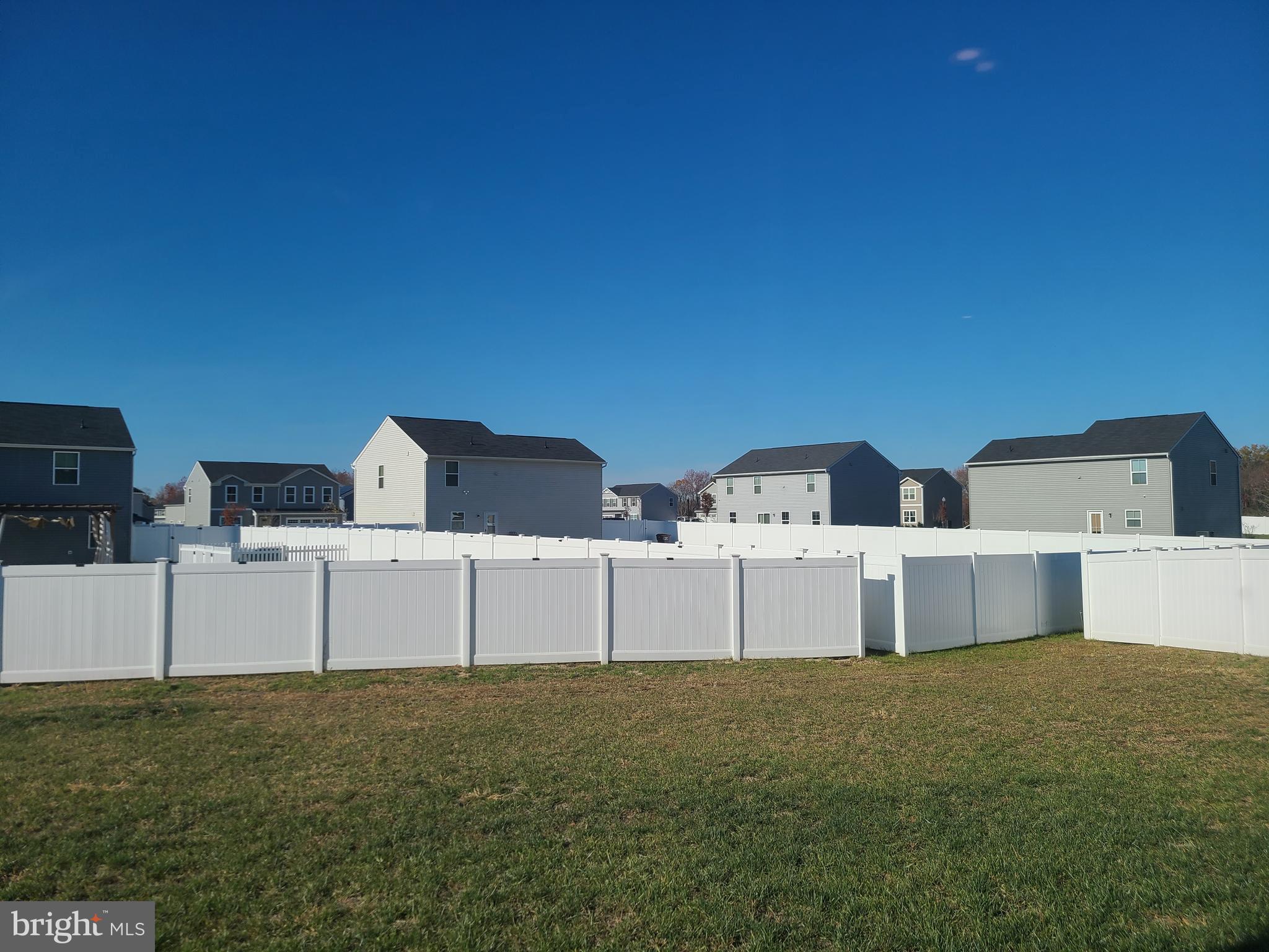 105 Mariners Way Cambridge, MD 21613 - Photo 30 of 45 a view of a house with a back yard