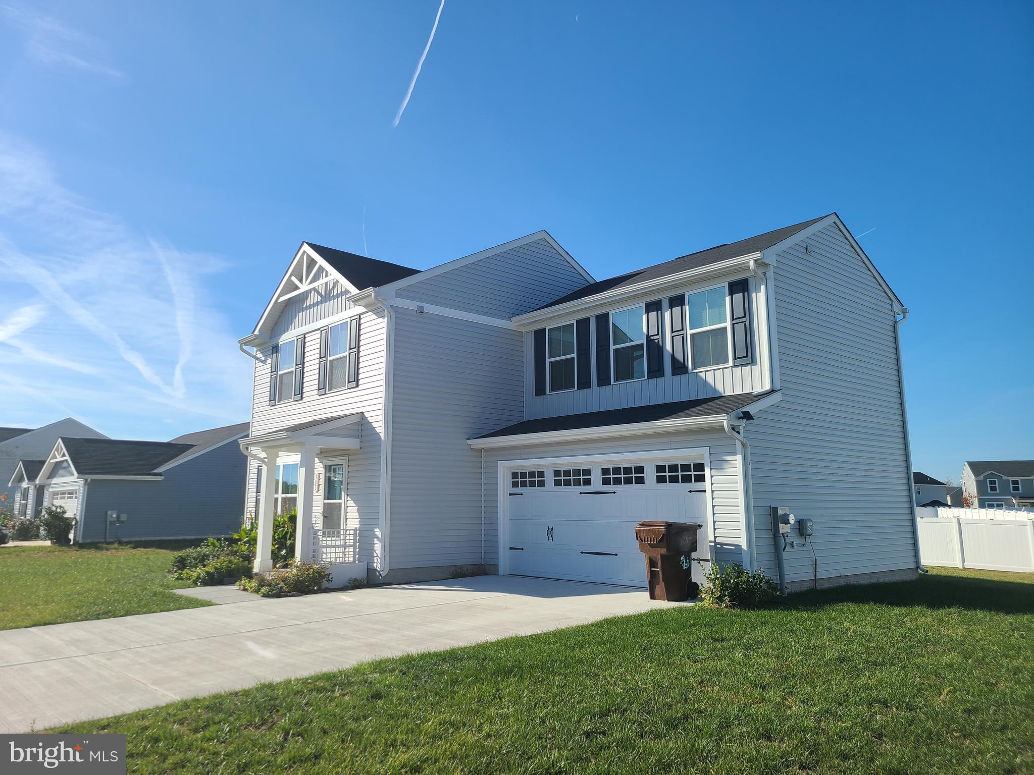 105 Mariners Way Cambridge, MD 21613 - Photo 44 of 45 a view of house with yard and green space