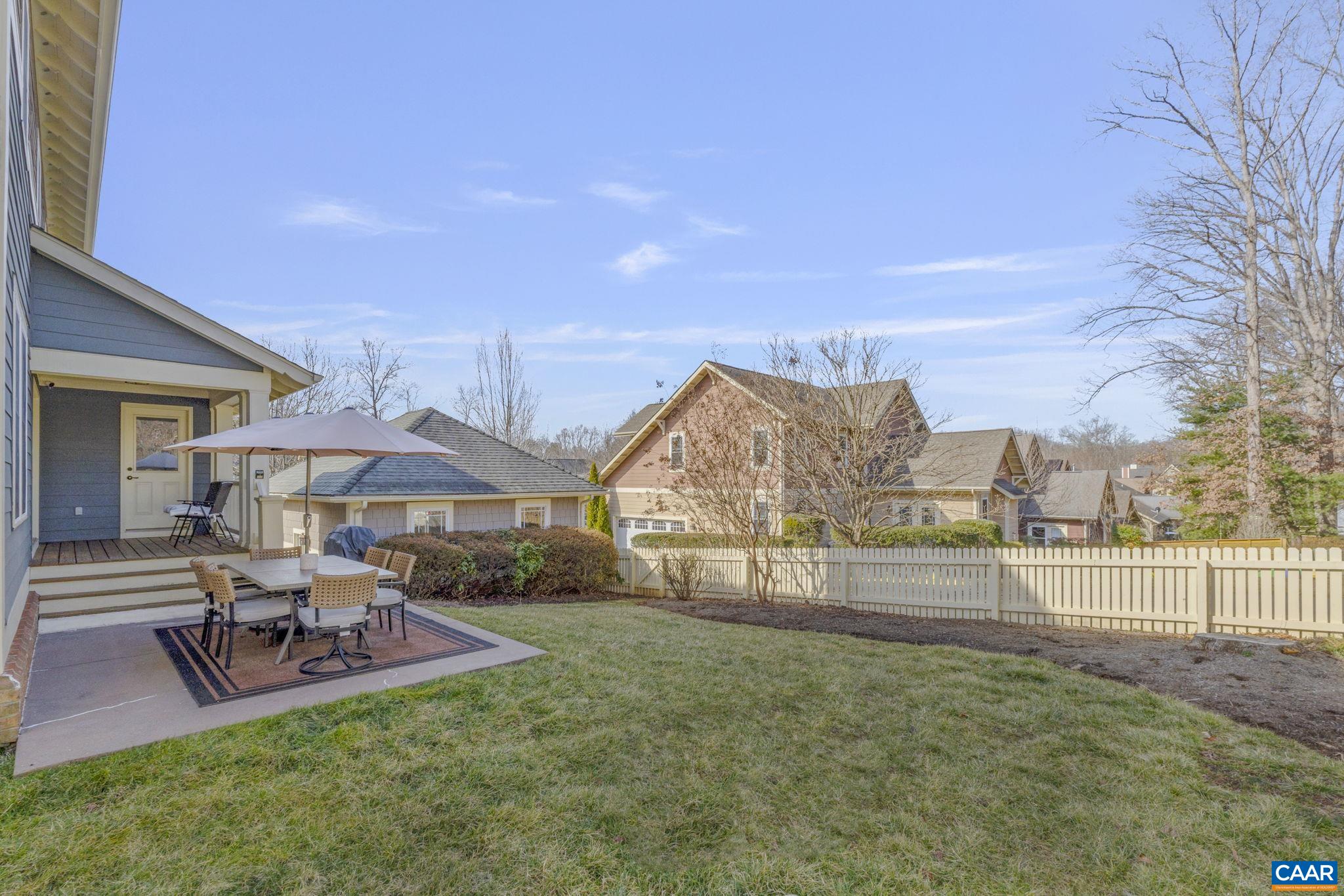 811 Village Road Charlottesville, VA 22903 - Photo 49 of 66 a view of a house with backyard porch and sitting area