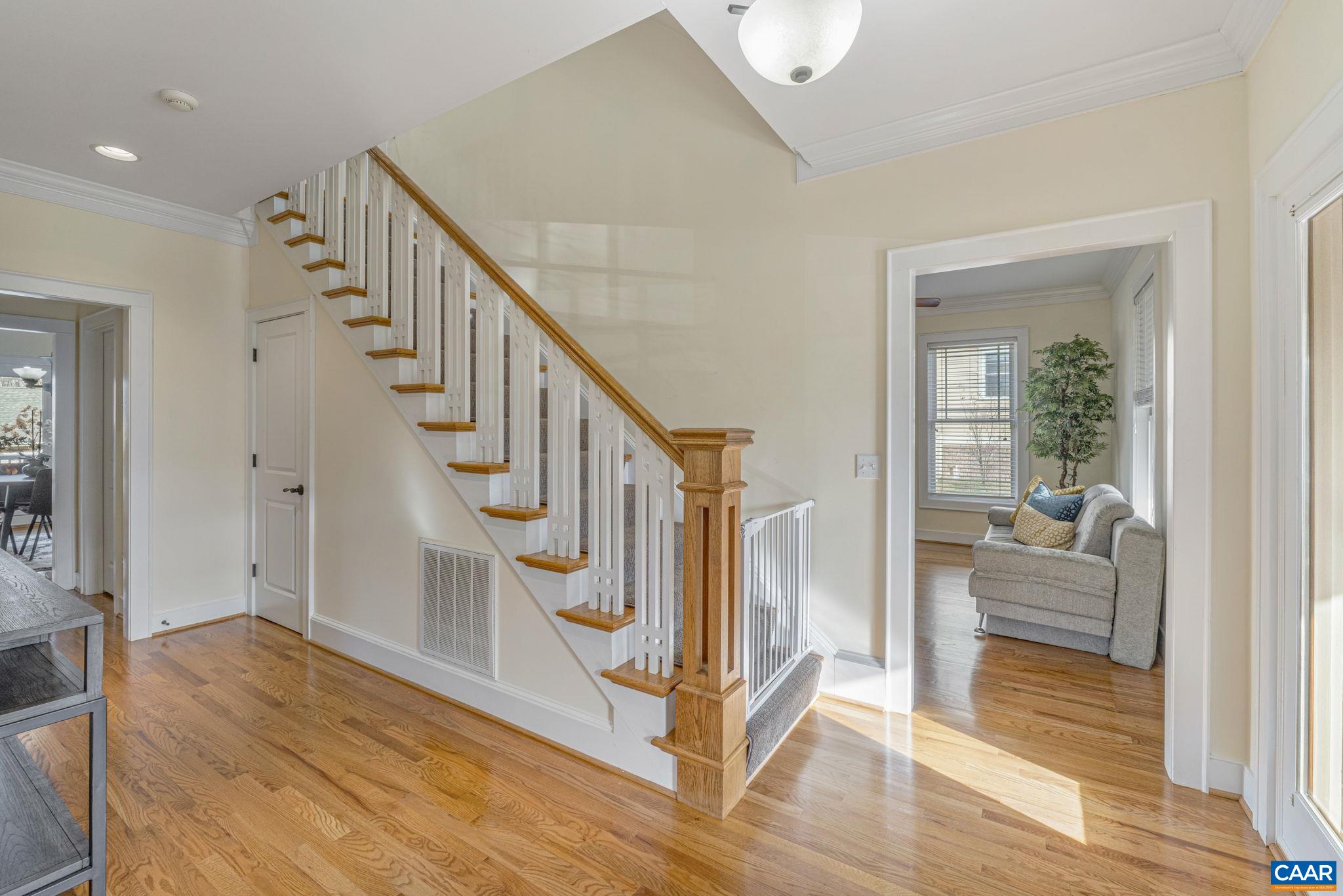 811 Village Road Charlottesville, VA 22903 - Photo 8 of 66 a view of entryway and hall with wooden floor