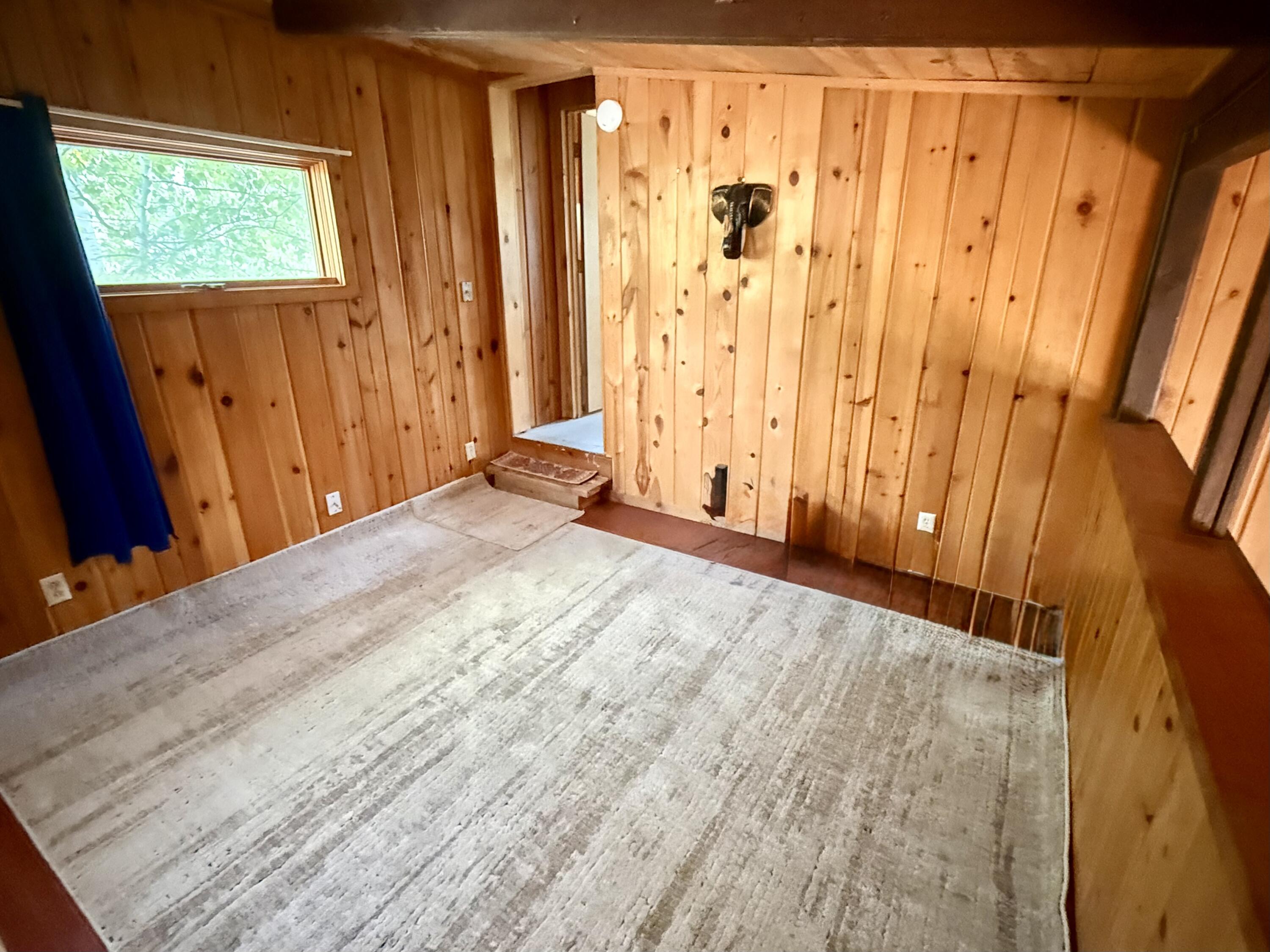 16025 Strawn Road La Pine, OR 97739 - Photo 21 of 70 a view of a room with wooden walls