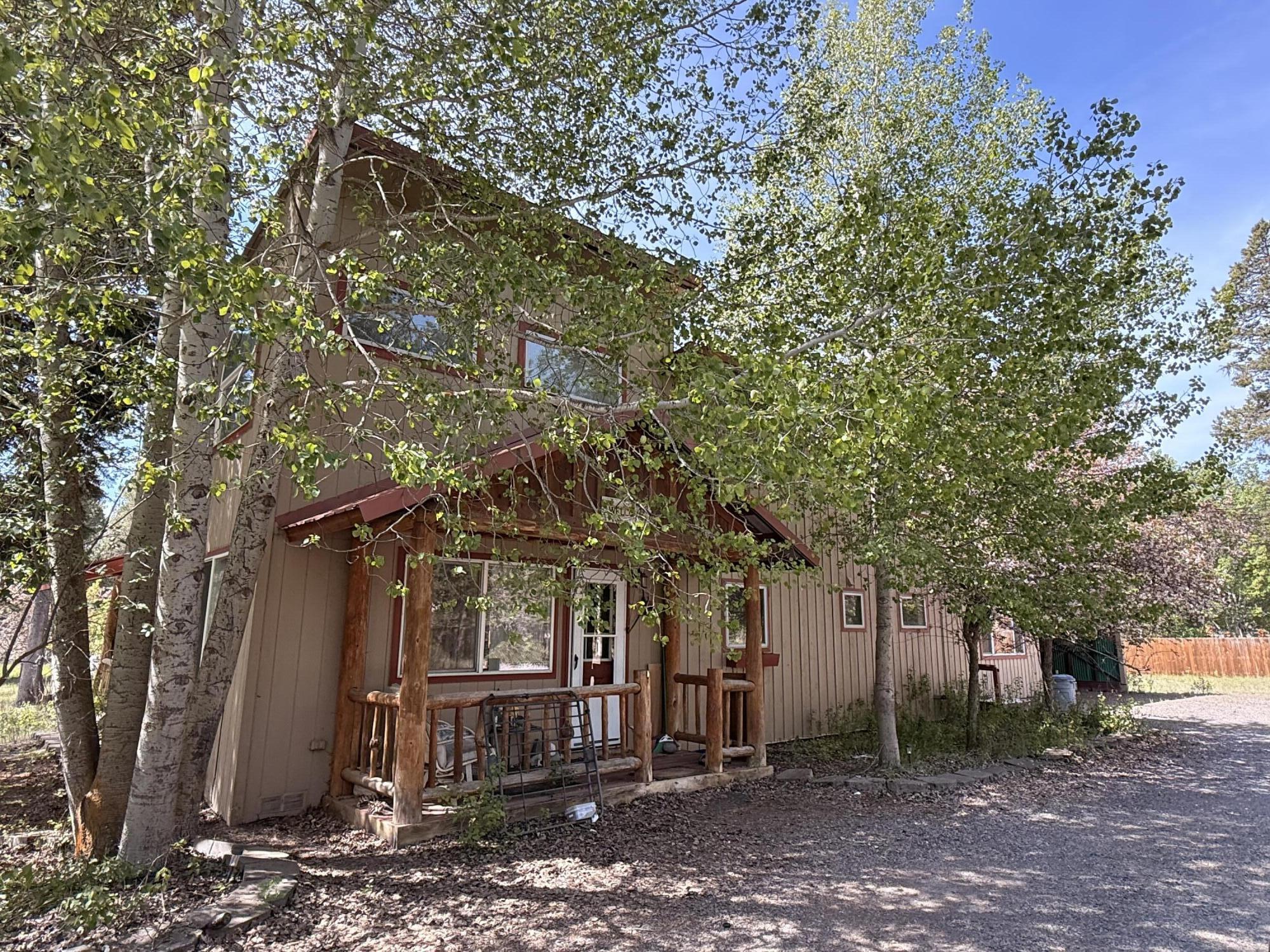 16025 Strawn Road La Pine, OR 97739 - Photo 3 of 70 a view of a house with a tree