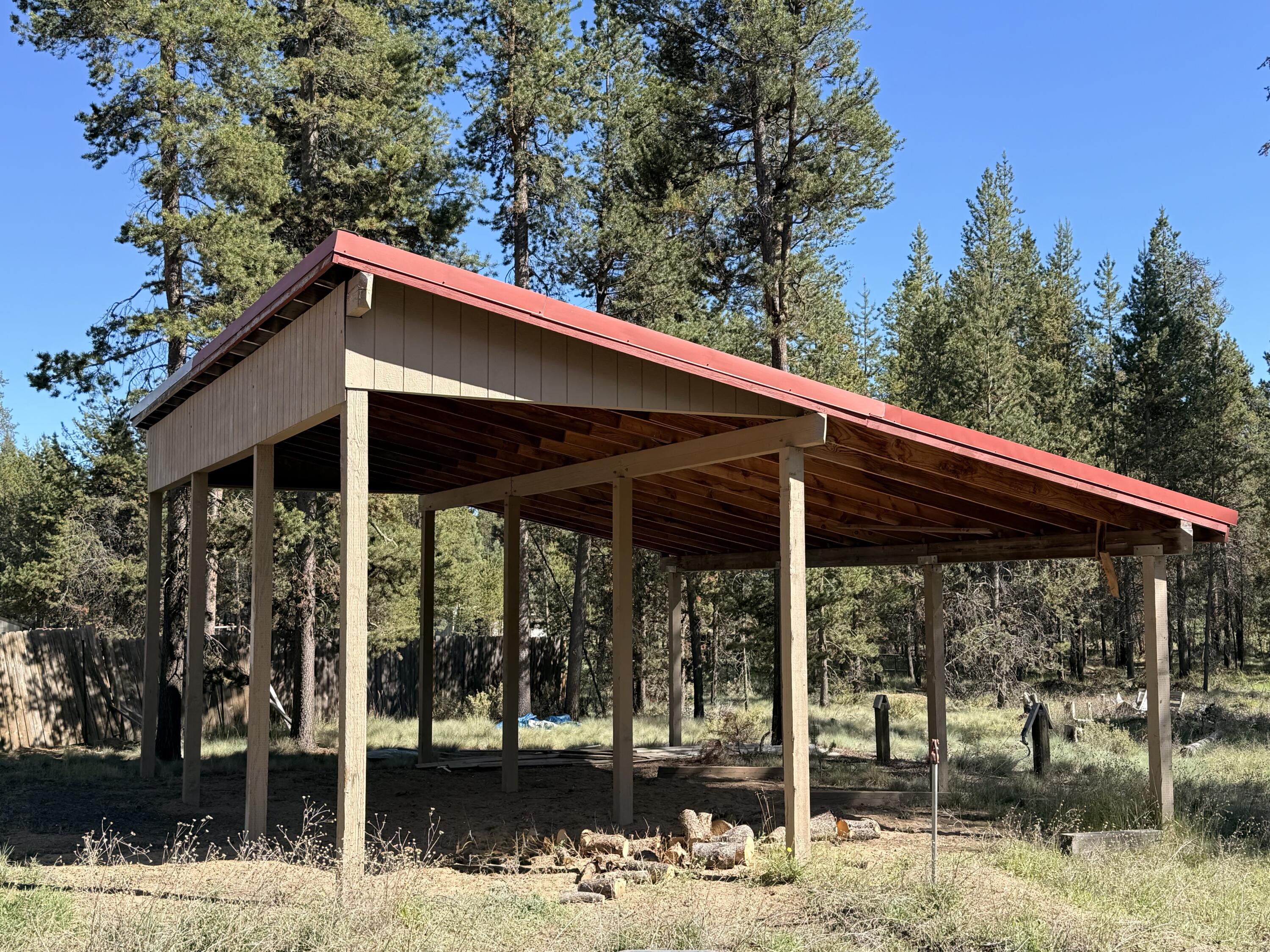 16025 Strawn Road La Pine, OR 97739 - Photo 32 of 70 a backyard of a house with a fountain table and chairs