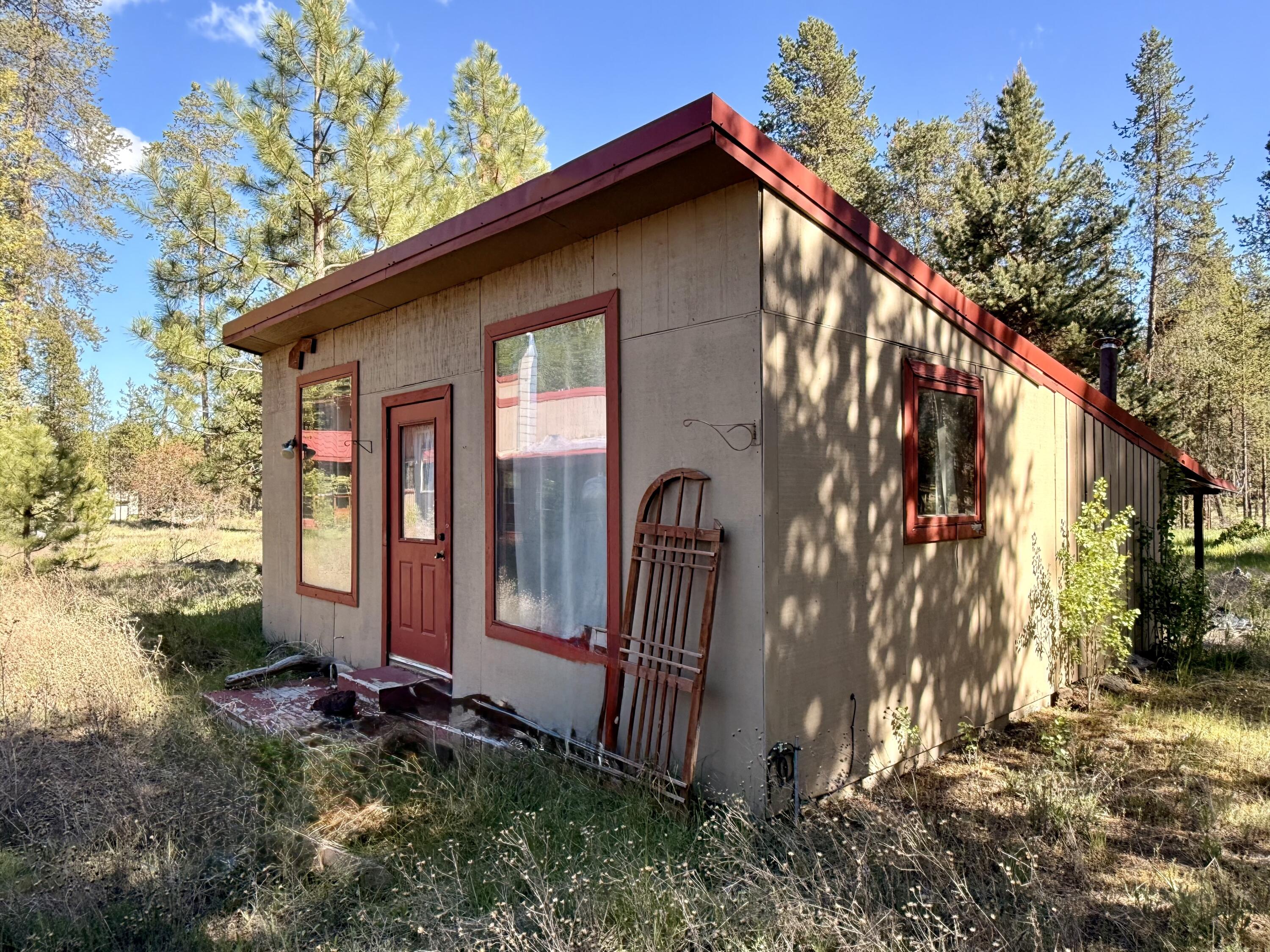 16025 Strawn Road La Pine, OR 97739 - Photo 49 of 70 a view of a house with a yard