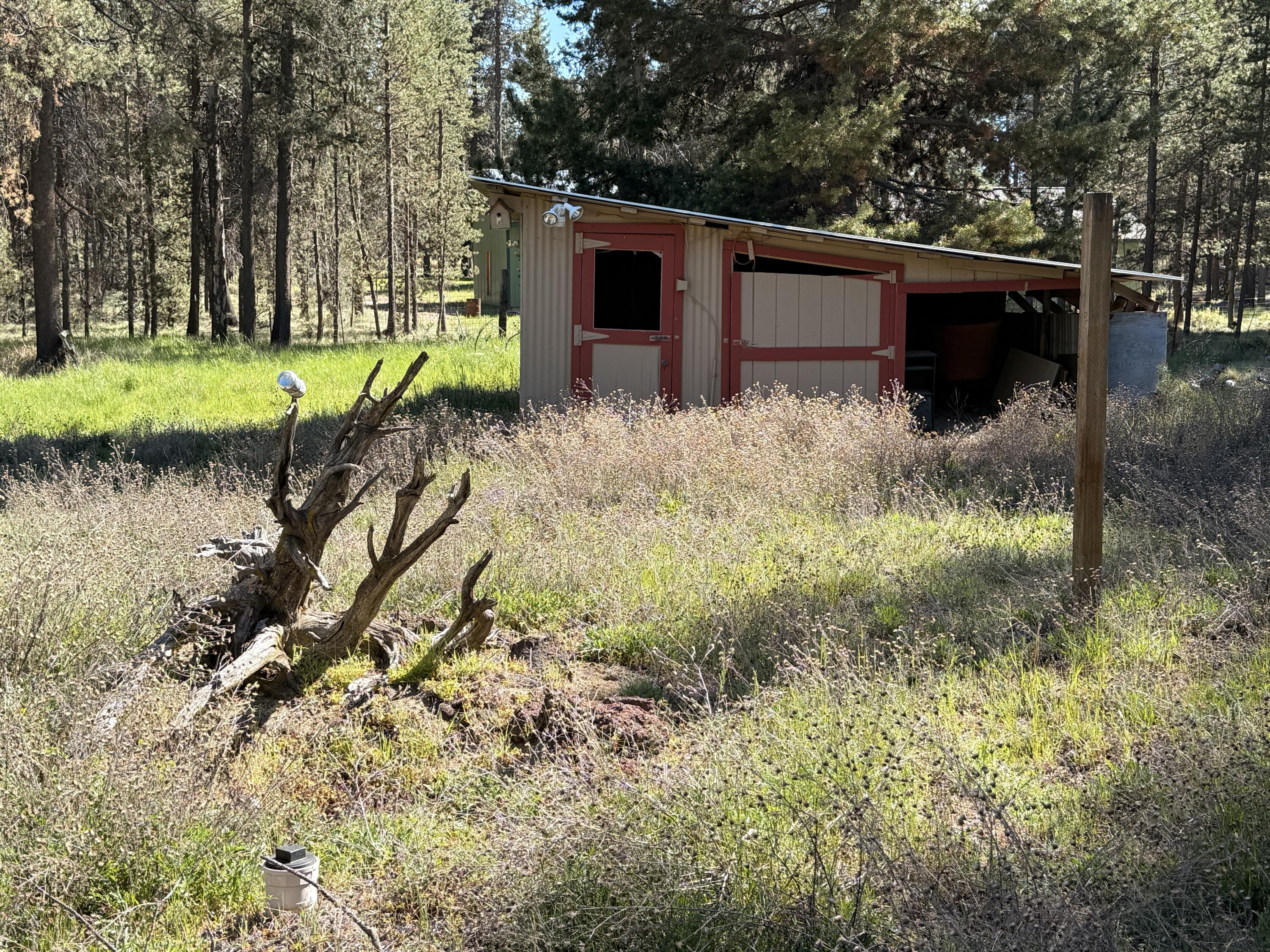 16025 Strawn Road La Pine, OR 97739 - Photo 53 of 70 a backyard of a house with a yard and outdoor seating