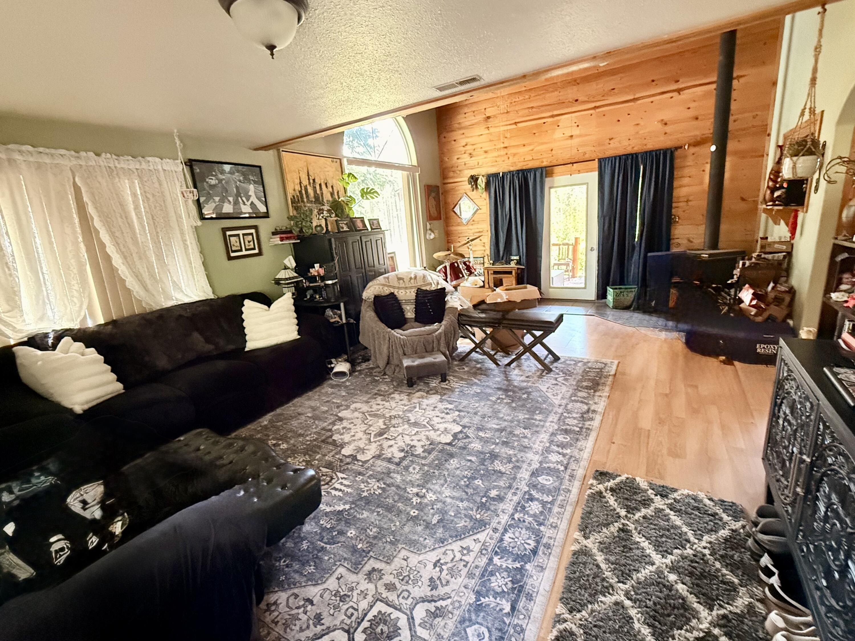 16025 Strawn Road La Pine, OR 97739 - Photo 6 of 70 a living room with furniture and a fireplace