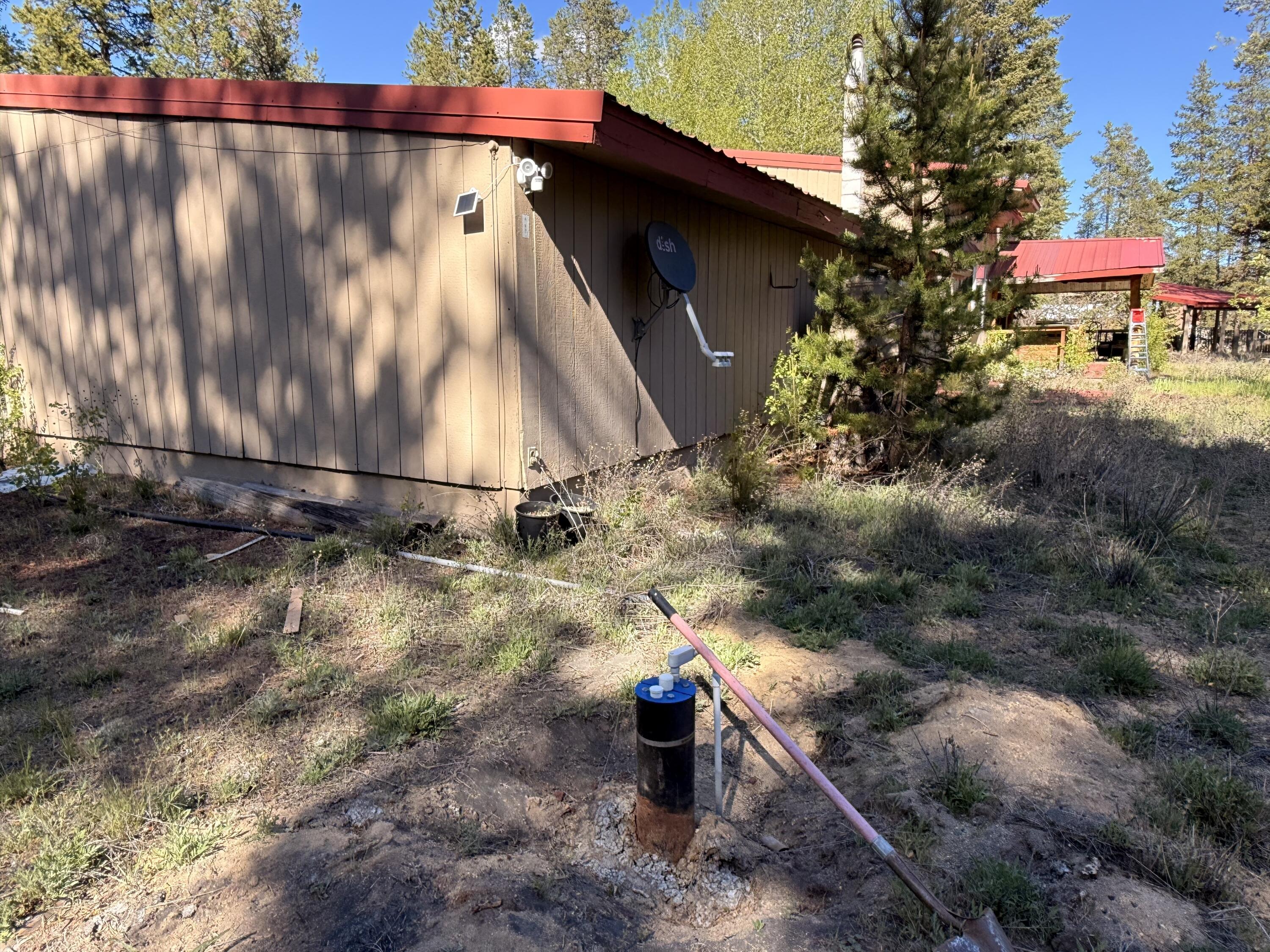 16025 Strawn Road La Pine, OR 97739 - Photo 68 of 70 a small garden covered with tall trees
