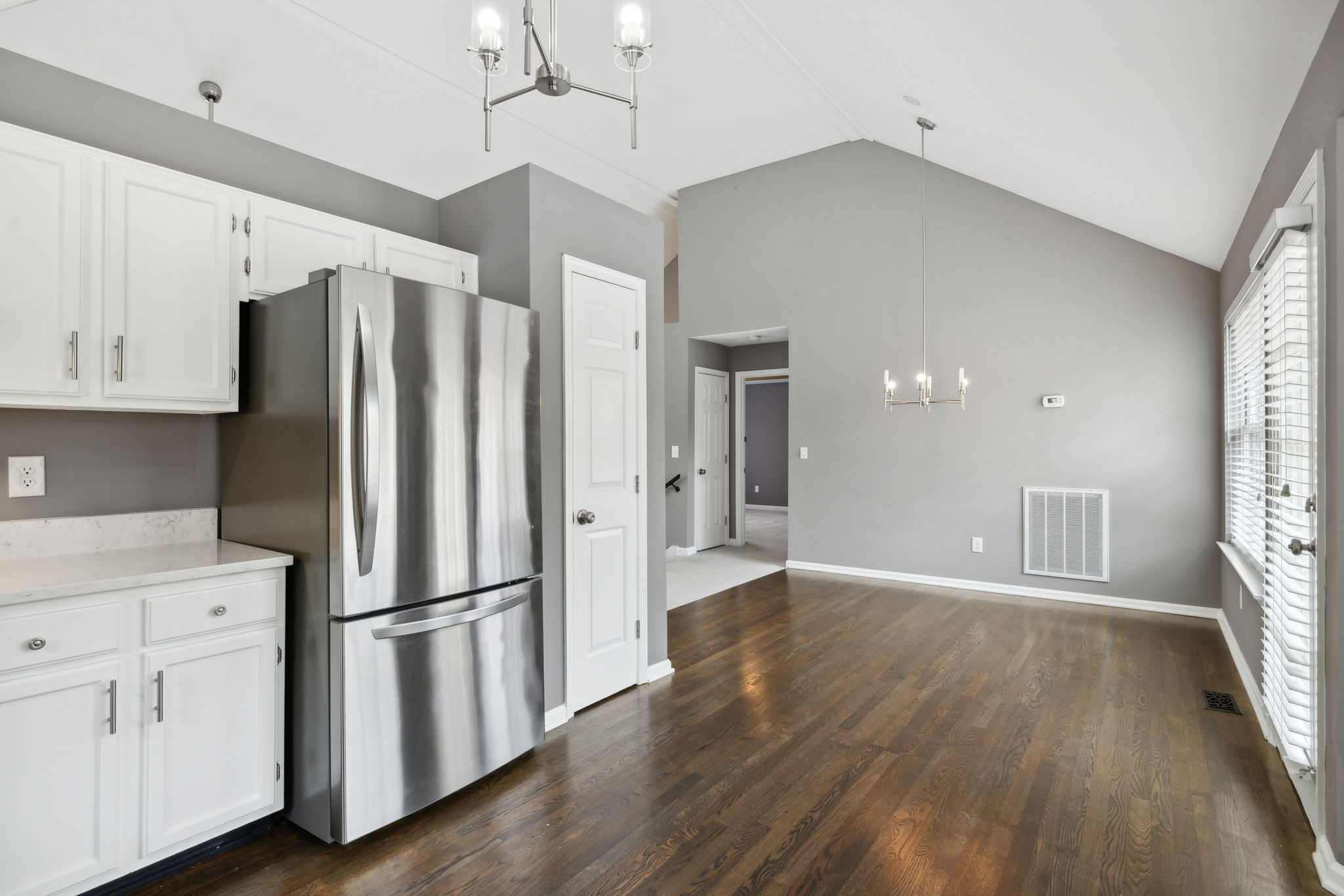 3014 Bent Tree Road Franklin, TN 37067 - Photo 11 of 28 a kitchen with stainless steel appliances a refrigerator and wooden floor
