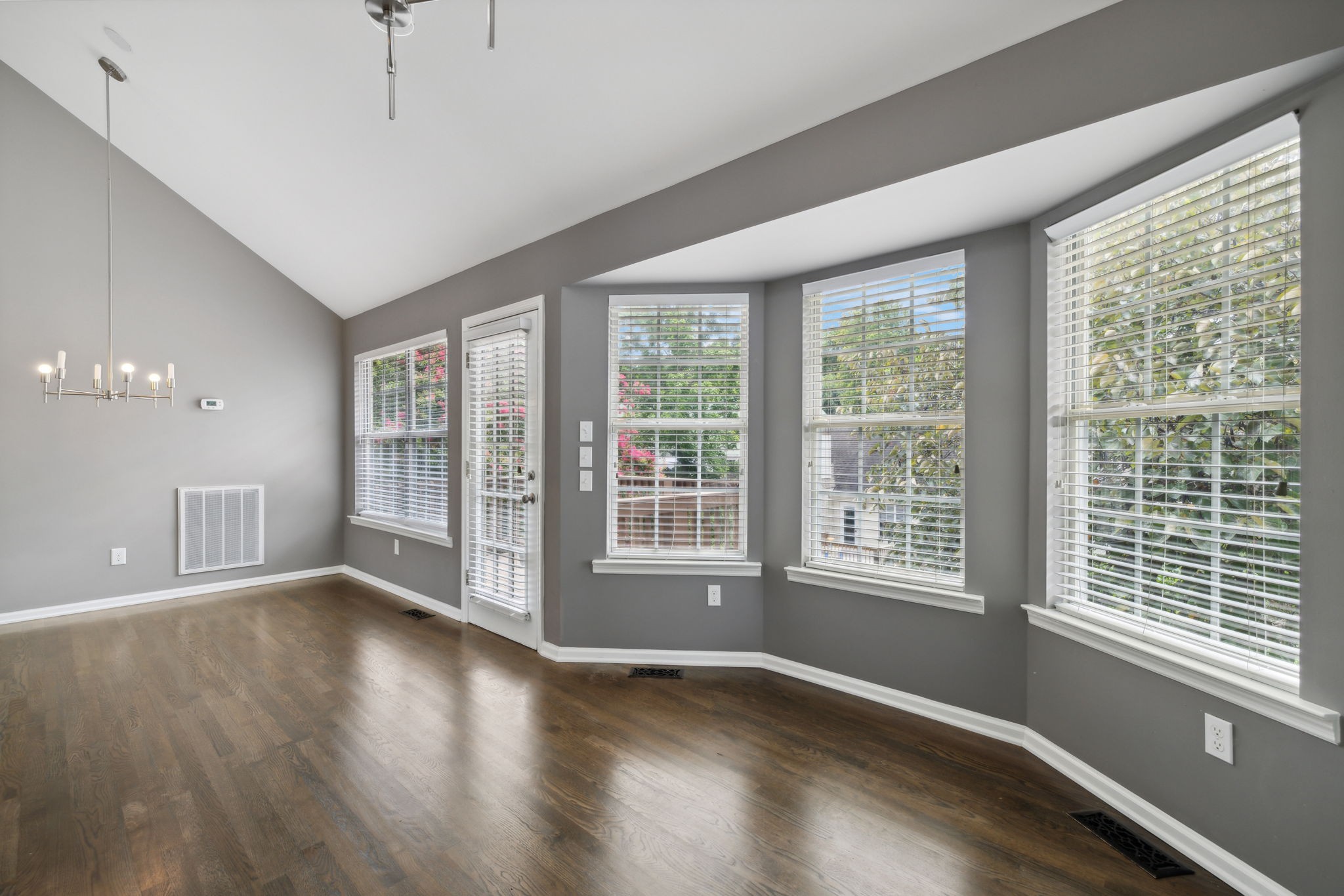 3014 Bent Tree Road Franklin, TN 37067 - Photo 13 of 28 a view of an empty room with wooden floor and a window