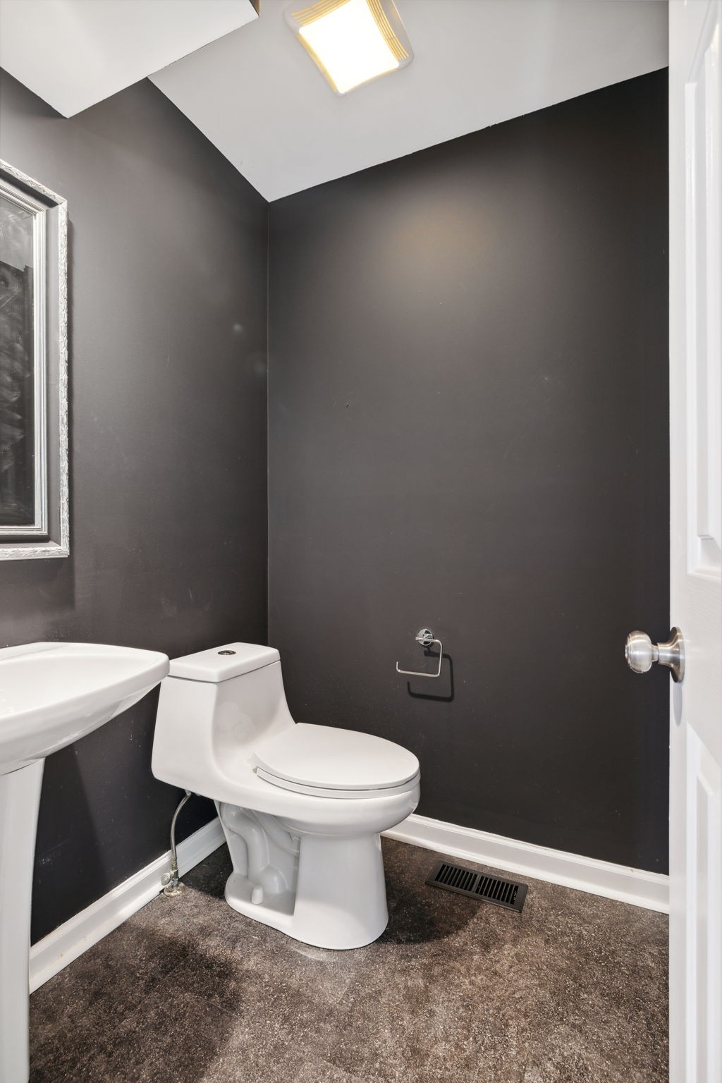 3014 Bent Tree Road Franklin, TN 37067 - Photo 14 of 28 a white toilet sitting next to a bathroom sink