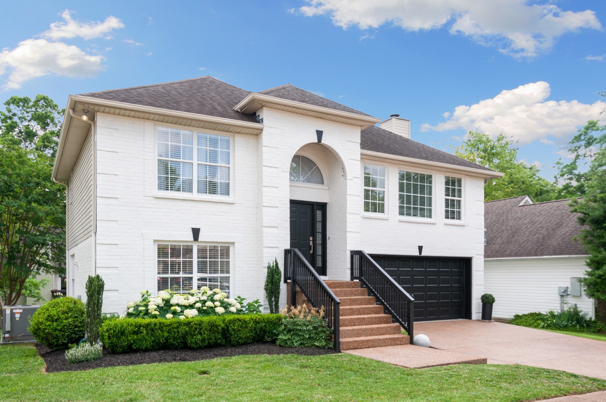 3014 Bent Tree Road Franklin, TN 37067 - Photo 2 of 28 a front view of a house with a yard