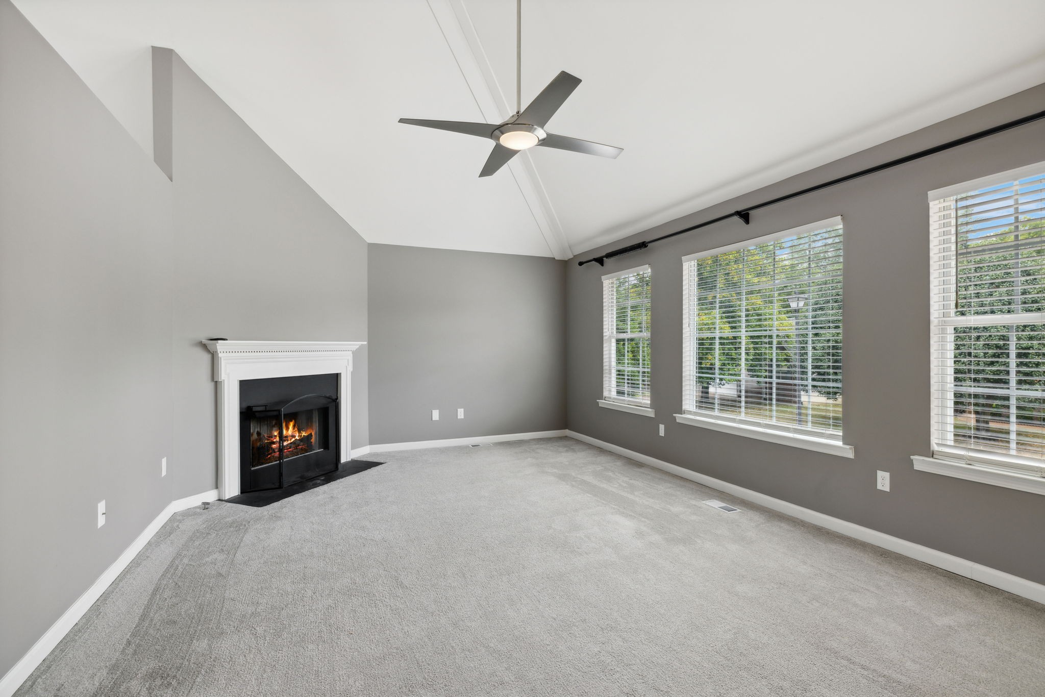 3014 Bent Tree Road Franklin, TN 37067 - Photo 4 of 28 a view of an empty room with a window and a fireplace