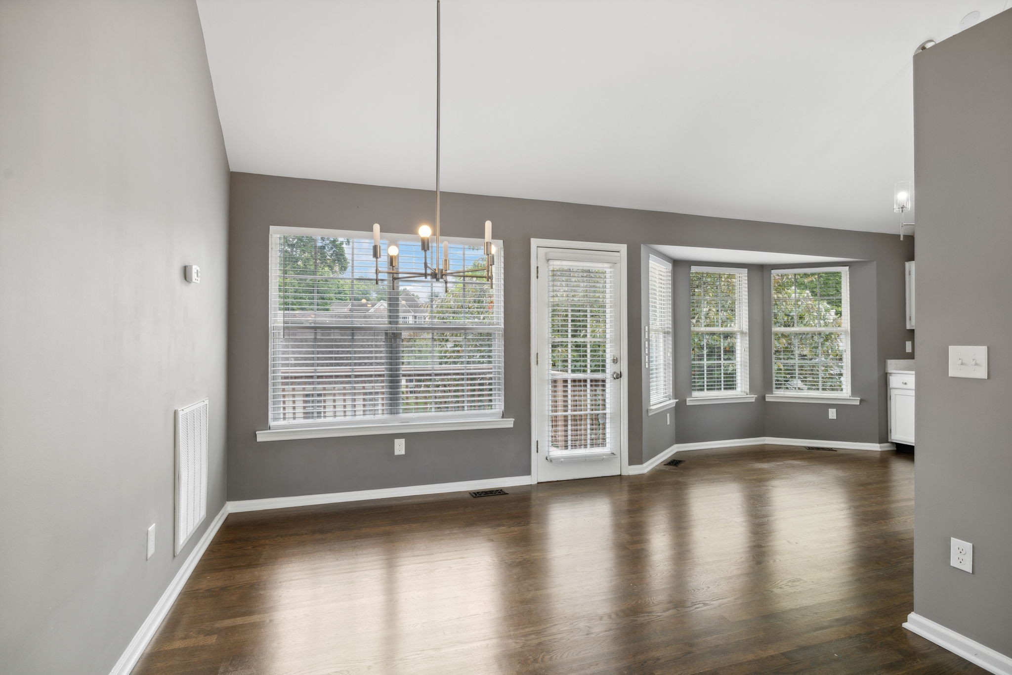 3014 Bent Tree Road Franklin, TN 37067 - Photo 7 of 28 a view of empty room with wooden floor and fan