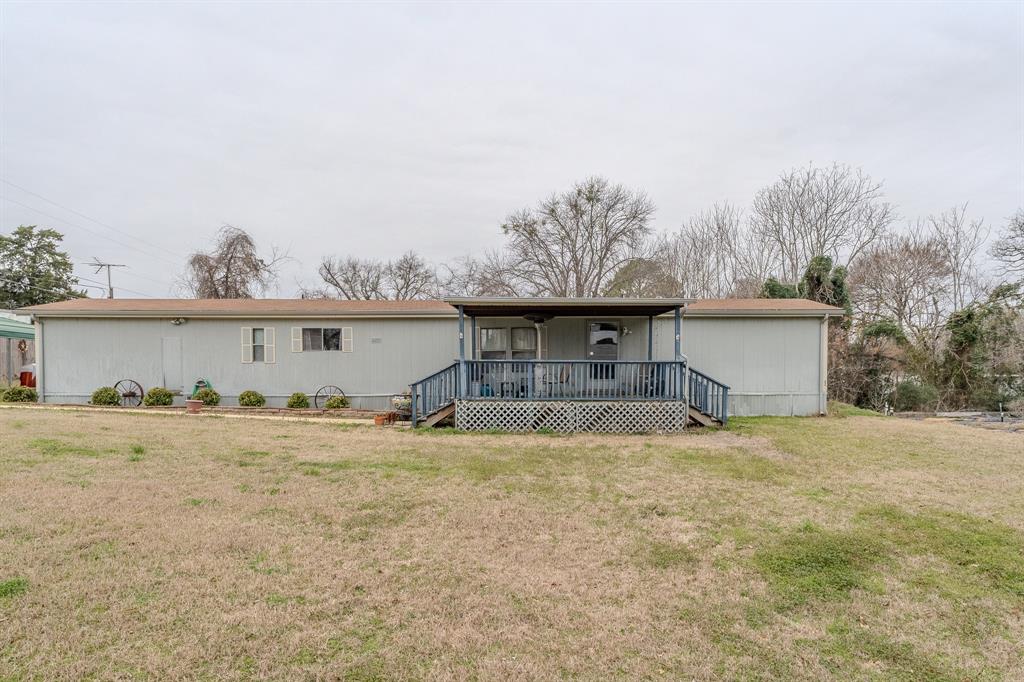 1816 Austin Aisle Tool, TX 75143 - Photo 1 of 26 a house that has a tree in front of it
