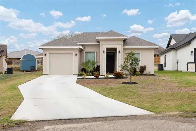 a view of a house with entertaining space