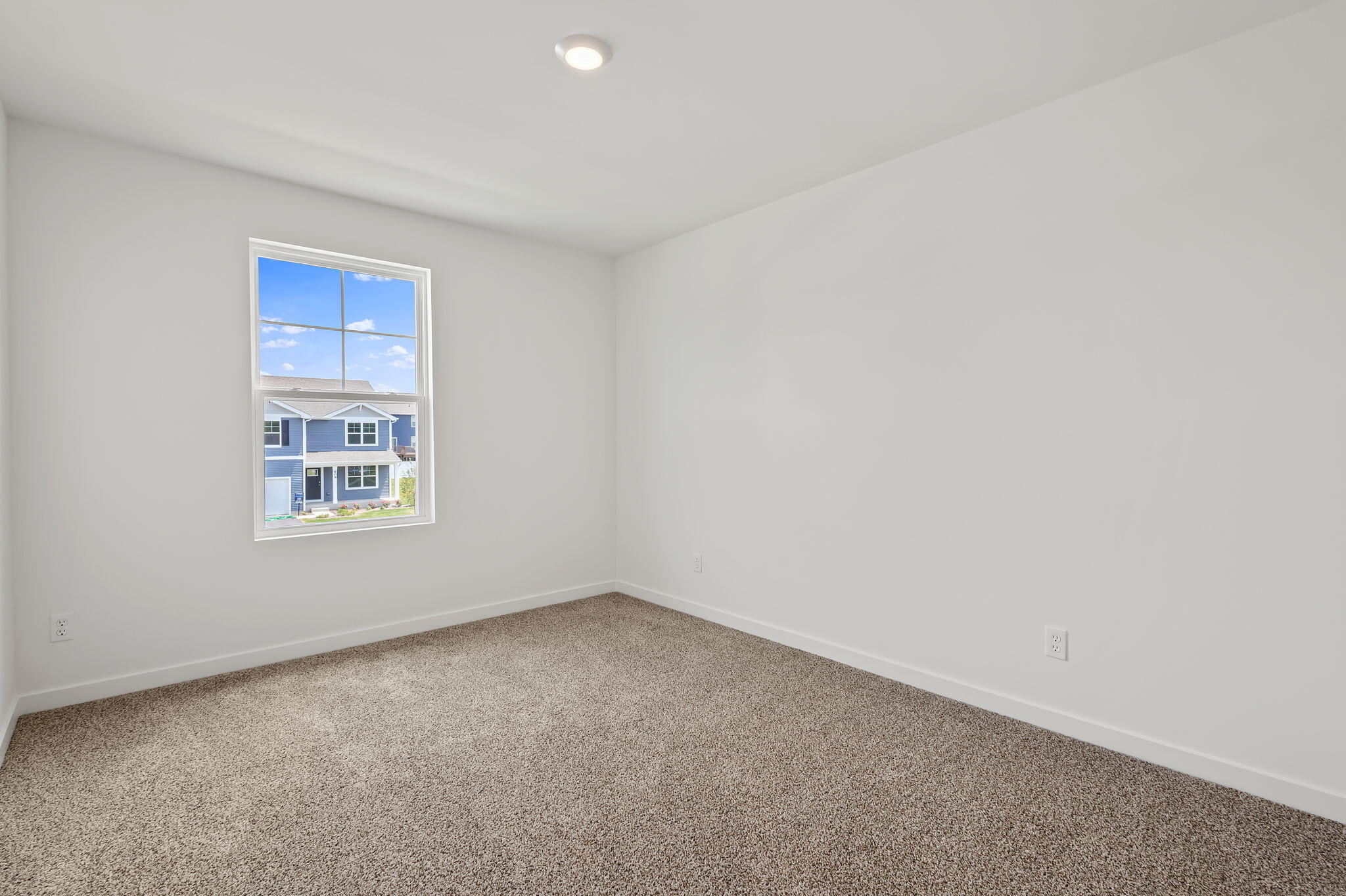 594 Petry Street Hebron, IN 46341 - Photo 14 of 18 a view of an empty room with a window