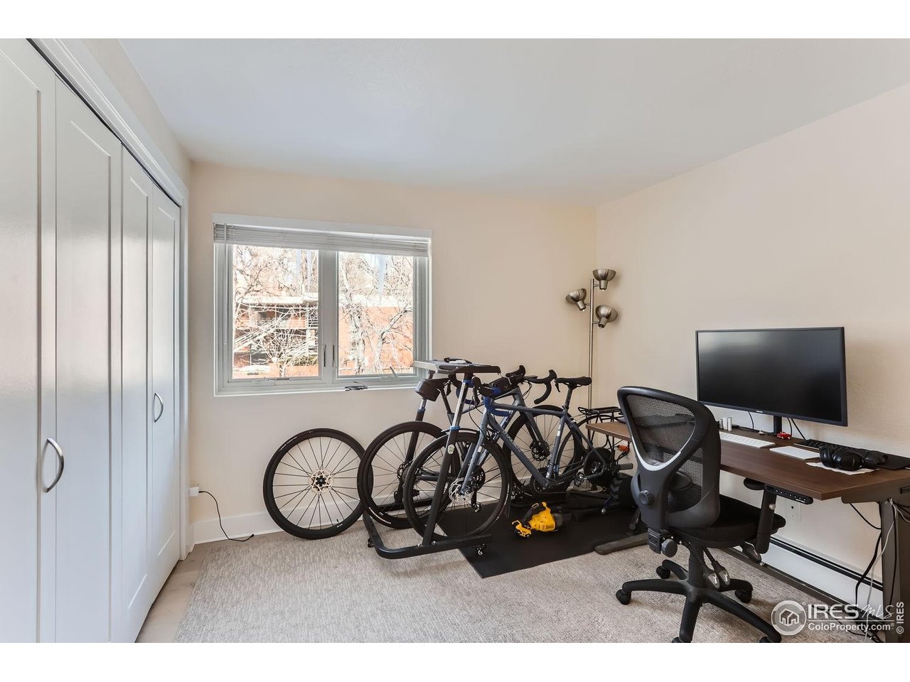 620 Pearl Street, Unit E Boulder, CO 80302 - Photo 12 of 37 a view of a livingroom with workspace and a window