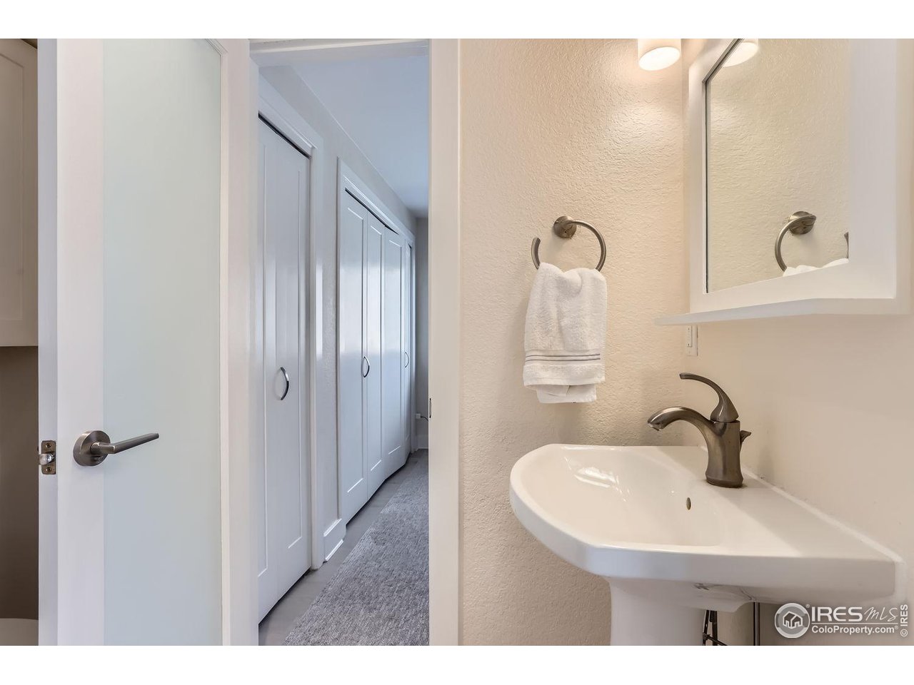 620 Pearl Street, Unit E Boulder, CO 80302 - Photo 14 of 37 a bathroom with a sink and mirror