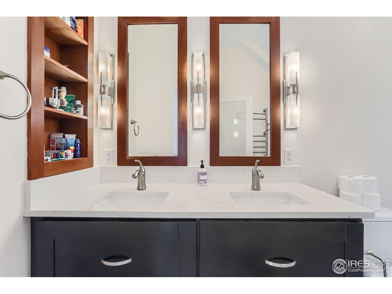 620 Pearl Street, Unit E Boulder, CO 80302 - Photo 18 of 37 a bathroom with double vanity and a mirror