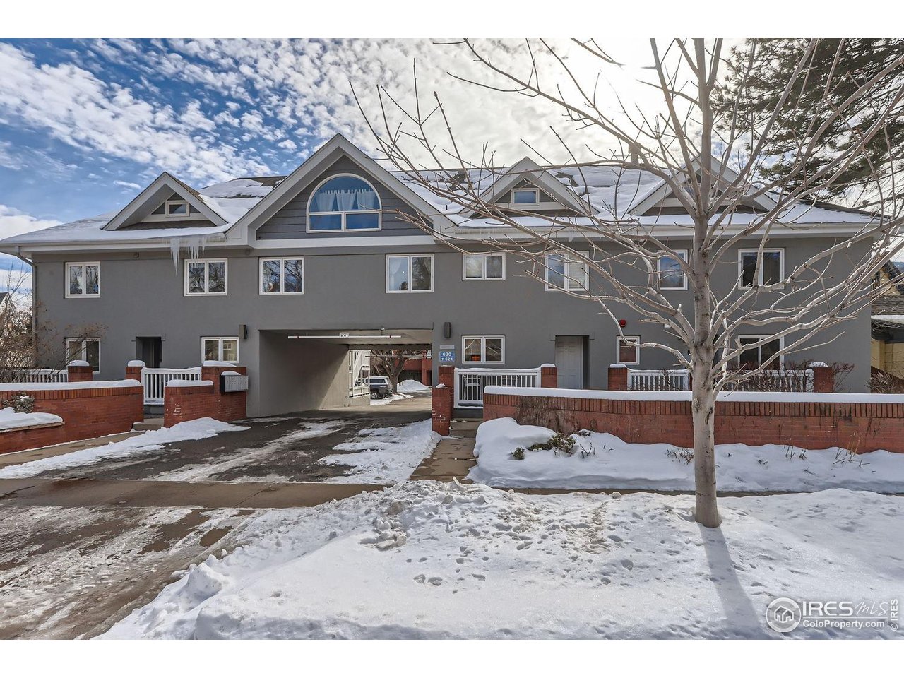 620 Pearl Street, Unit E Boulder, CO 80302 - Photo 25 of 37 front view of a house with a yard