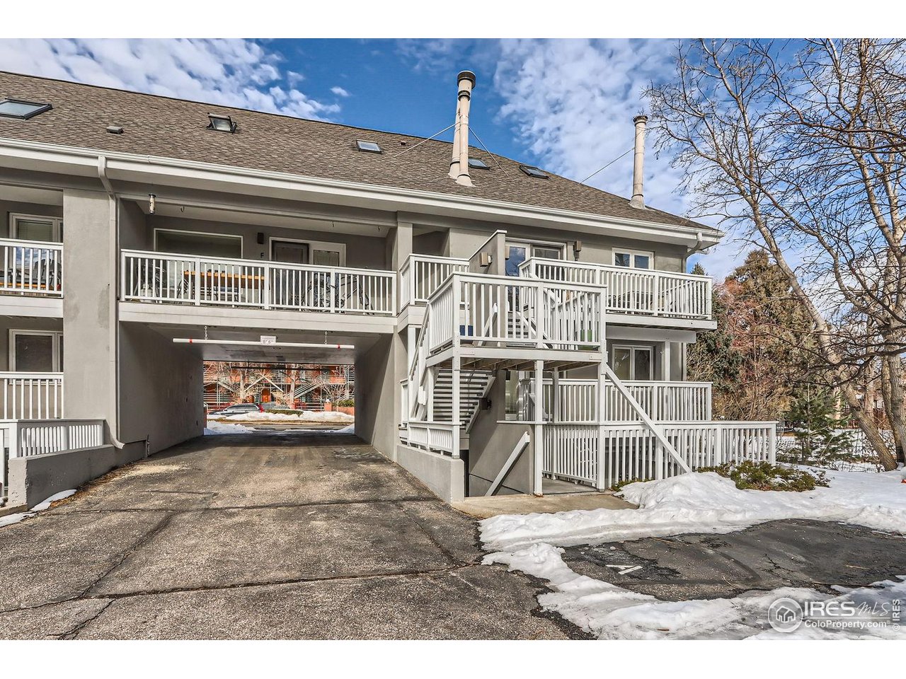 620 Pearl Street, Unit E Boulder, CO 80302 - Photo 36 of 37 a front view of a house with a yard
