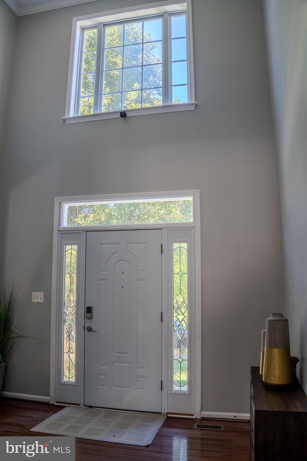 9737 Eustice Road Randallstown, MD 21133 - Photo 4 of 30 Bright entryway with elegant doors.