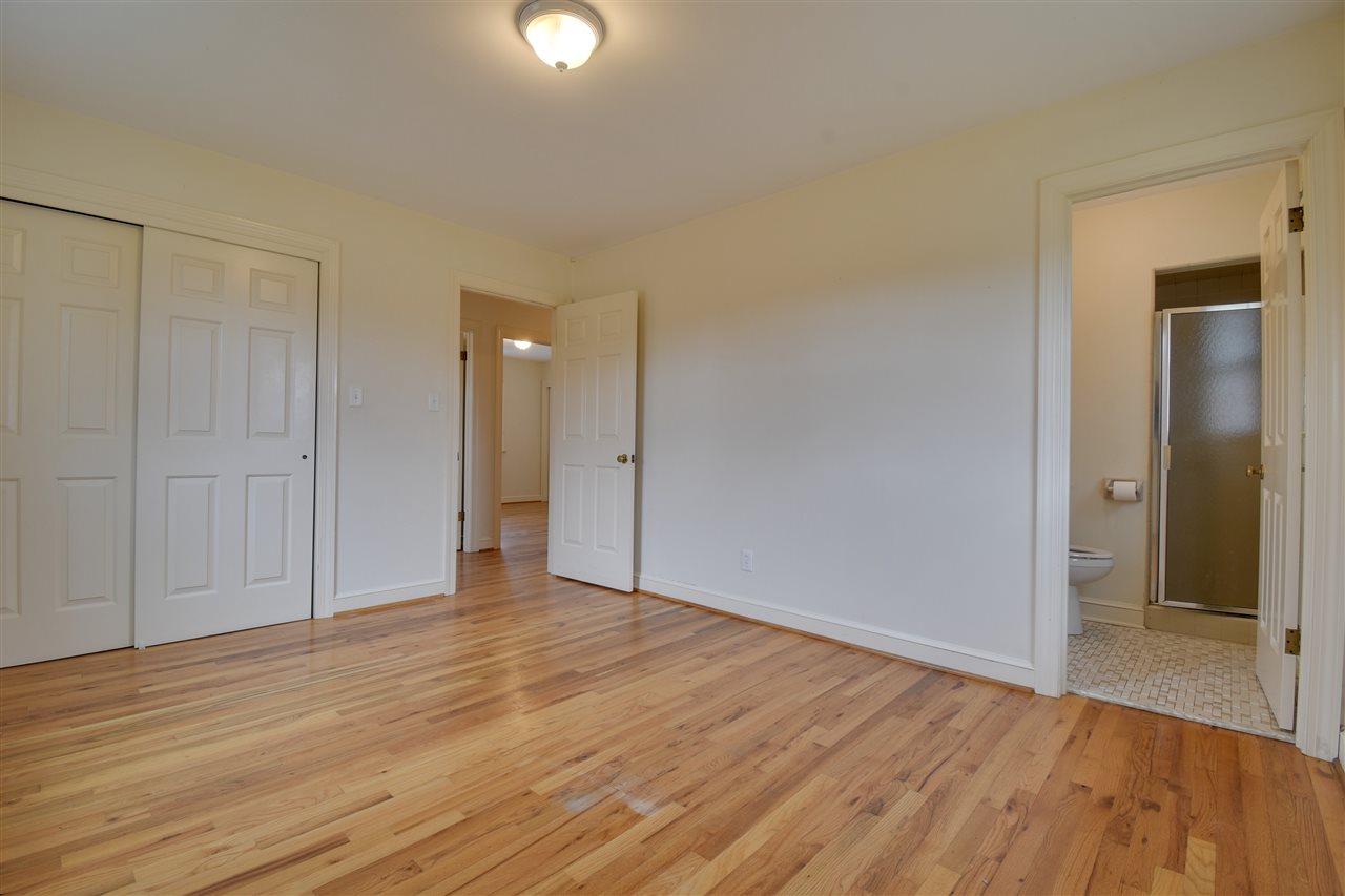 2041 Barterbrook Road Staunton, VA 24401 - Photo 9 of 30 a view of an empty room with wooden floor