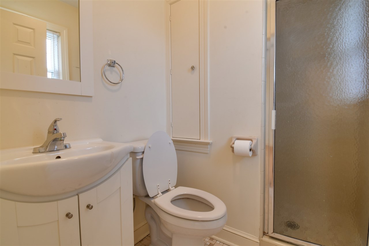 2041 Barterbrook Road Staunton, VA 24401 - Photo 10 of 30 a bathroom with a sink a toilet and a mirror