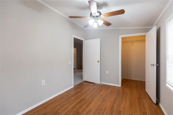 a view of a livingroom with wooden floor