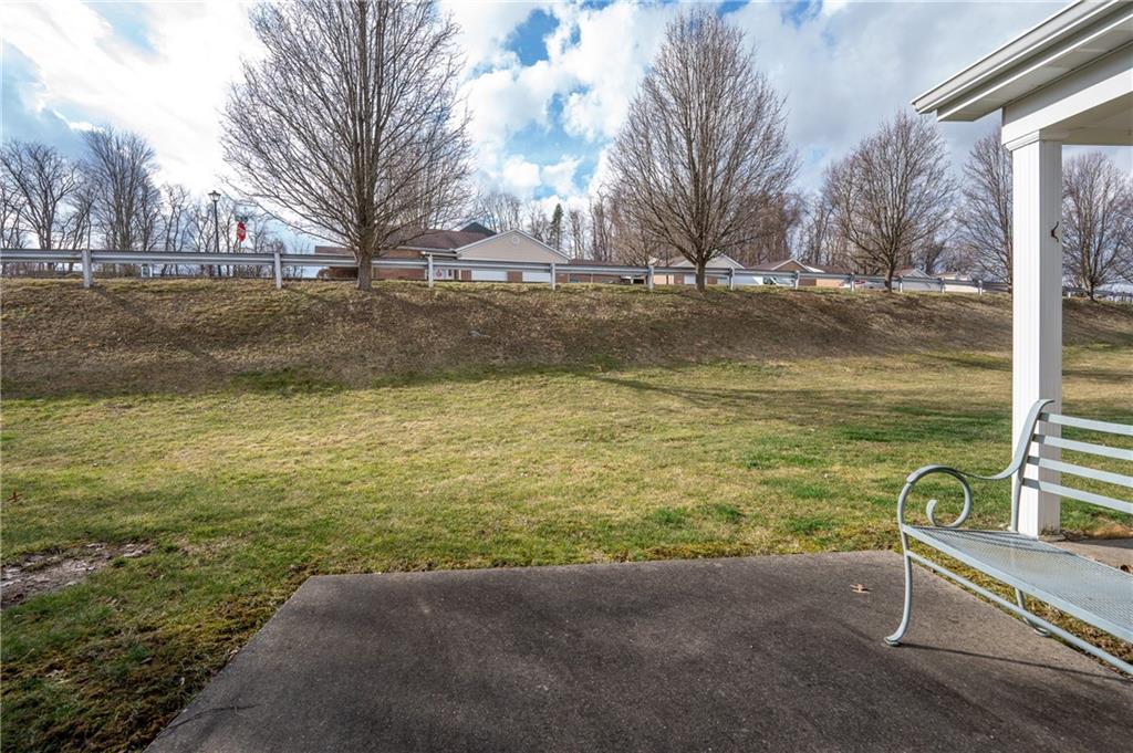 1468 Spring Crest Circle Latrobe, PA 15650 - Photo 23 of 30 a view of a yard with swimming pool