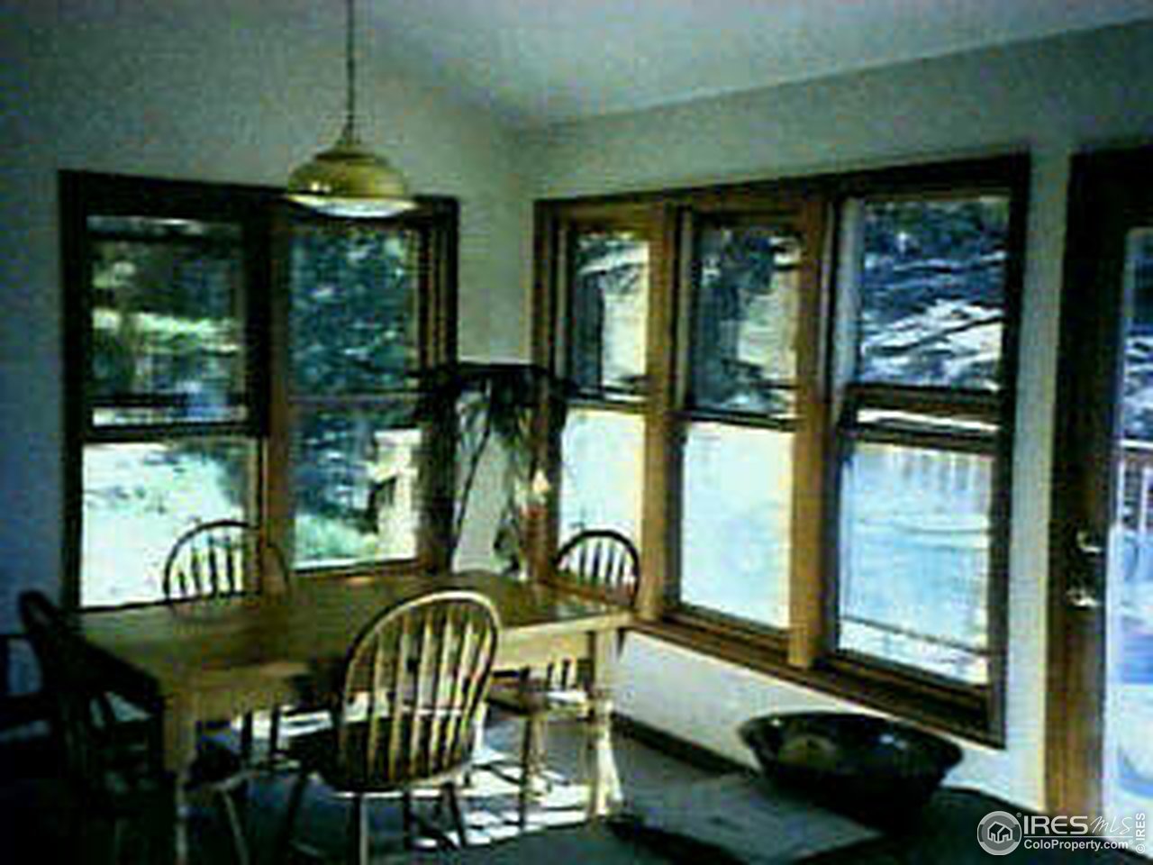 320 Logan Mill Road Boulder, CO 80302 - Photo 3 of 7 a view of a chairs and table in patio