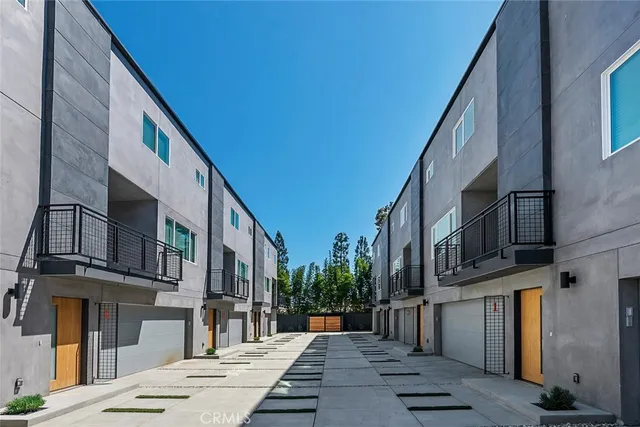 a view of a street with buildings