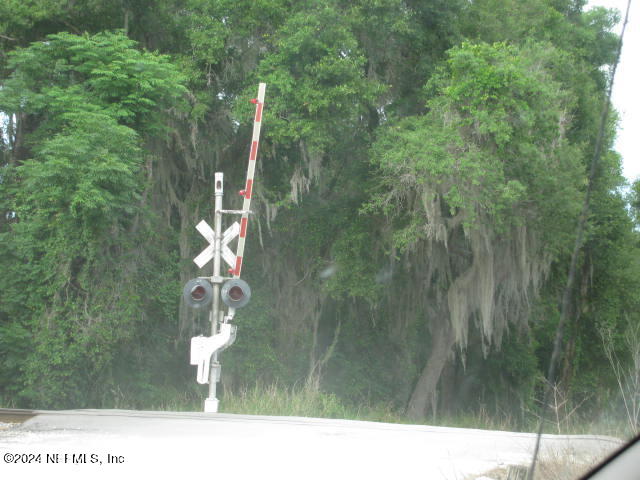 208 Clear Lake Road Crescent City, FL 32112 - Photo 4 of 14 GO OVER RAILROAD TRACK IMG_0045