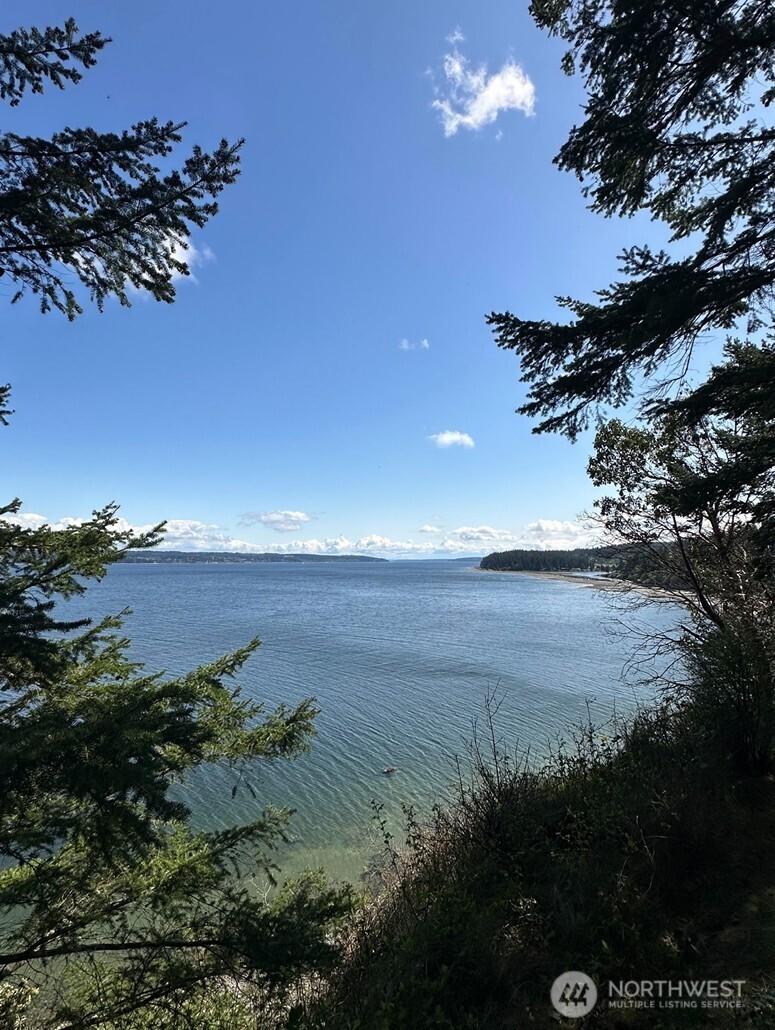0 South Harrington Road Coupeville, WA 98239 - Photo 13 of 18 a view of a lake in the sunset