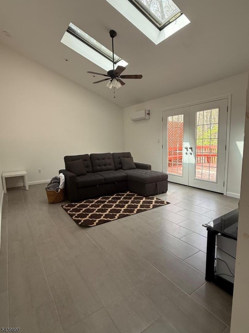 22 Karen Road Vernon, NJ 07422 - Photo 7 of 26 a living room with furniture and a window