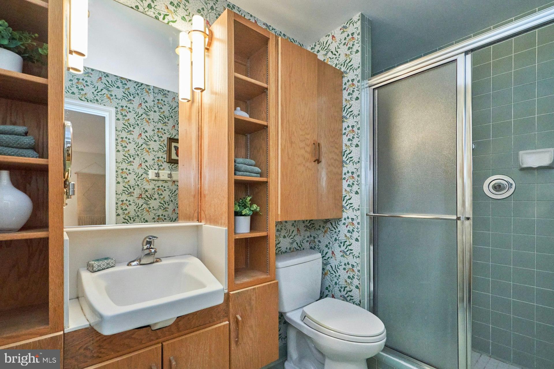 2002 Byrd Road Vienna, VA 22182 - Photo 25 of 48 Charming bathroom with floral accents.