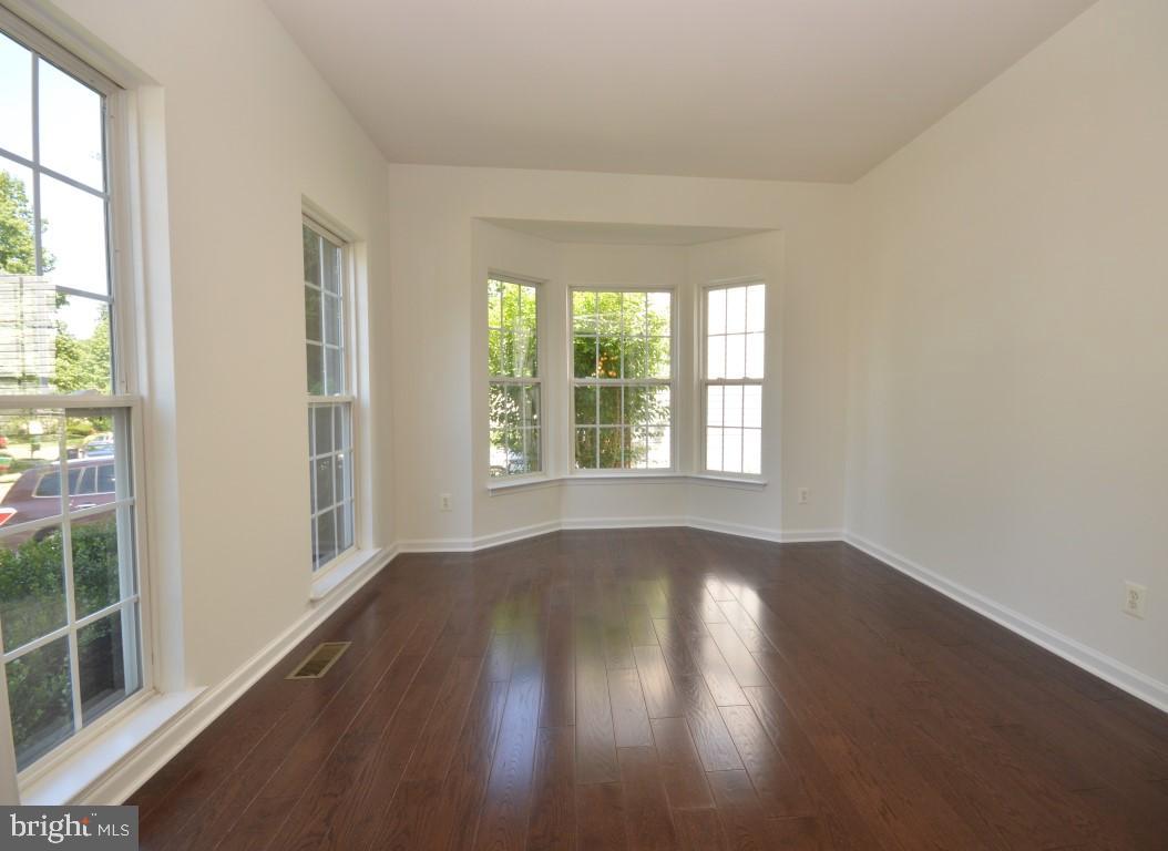 14444 Clubhouse Road Gainesville, VA 20155 - Photo 14 of 42 Living Room w/Bay Window & Hardwood Floors