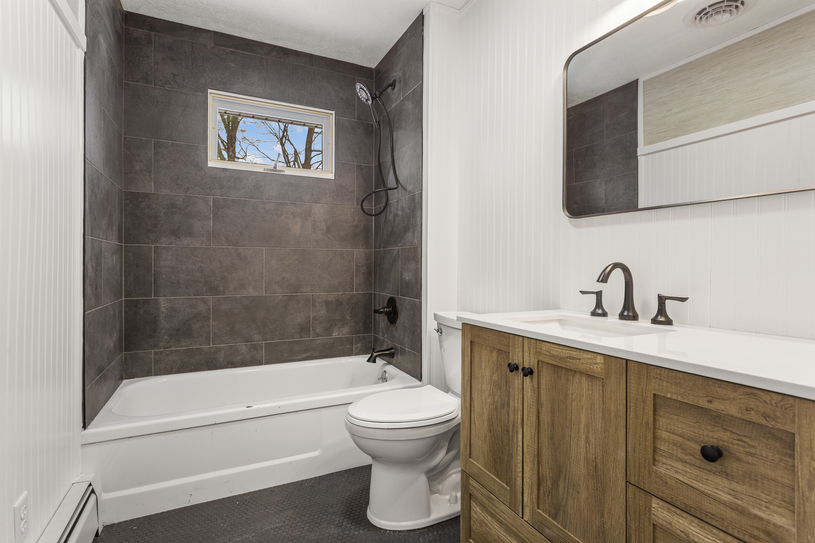 402 South Washington Street Saybrook, IL 61770 - Photo 18 of 24 a bathroom with a toilet a sink and bathtub
