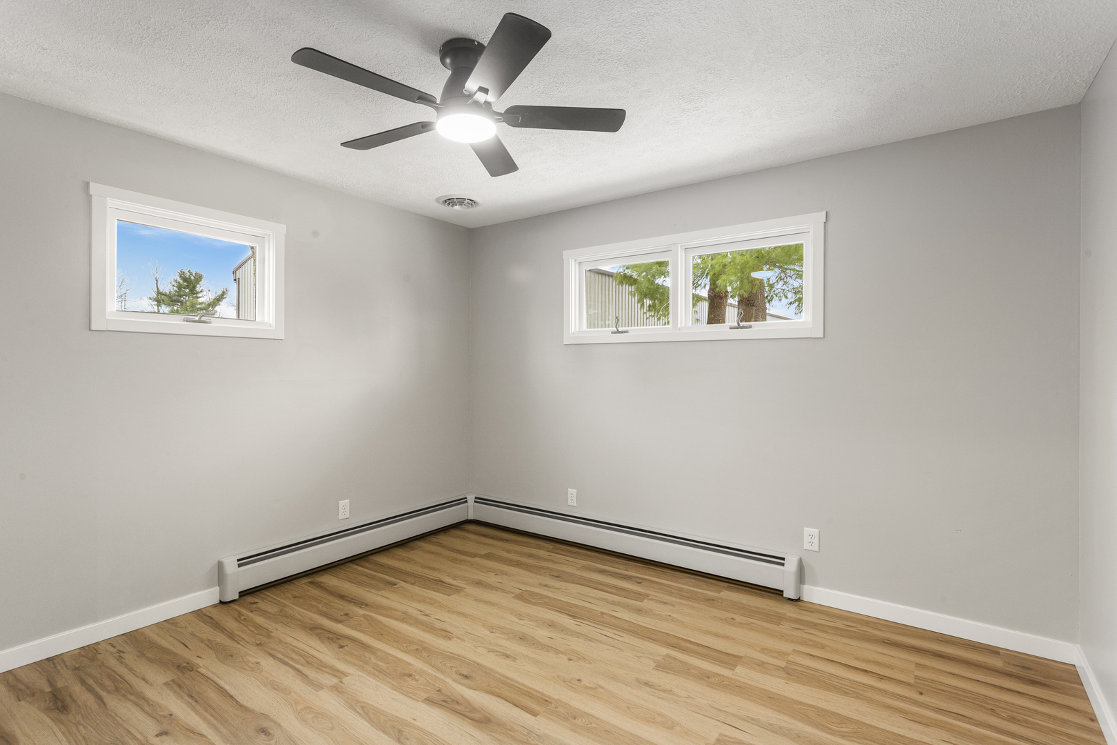 402 South Washington Street Saybrook, IL 61770 - Photo 19 of 24 a view of empty room with wooden floor