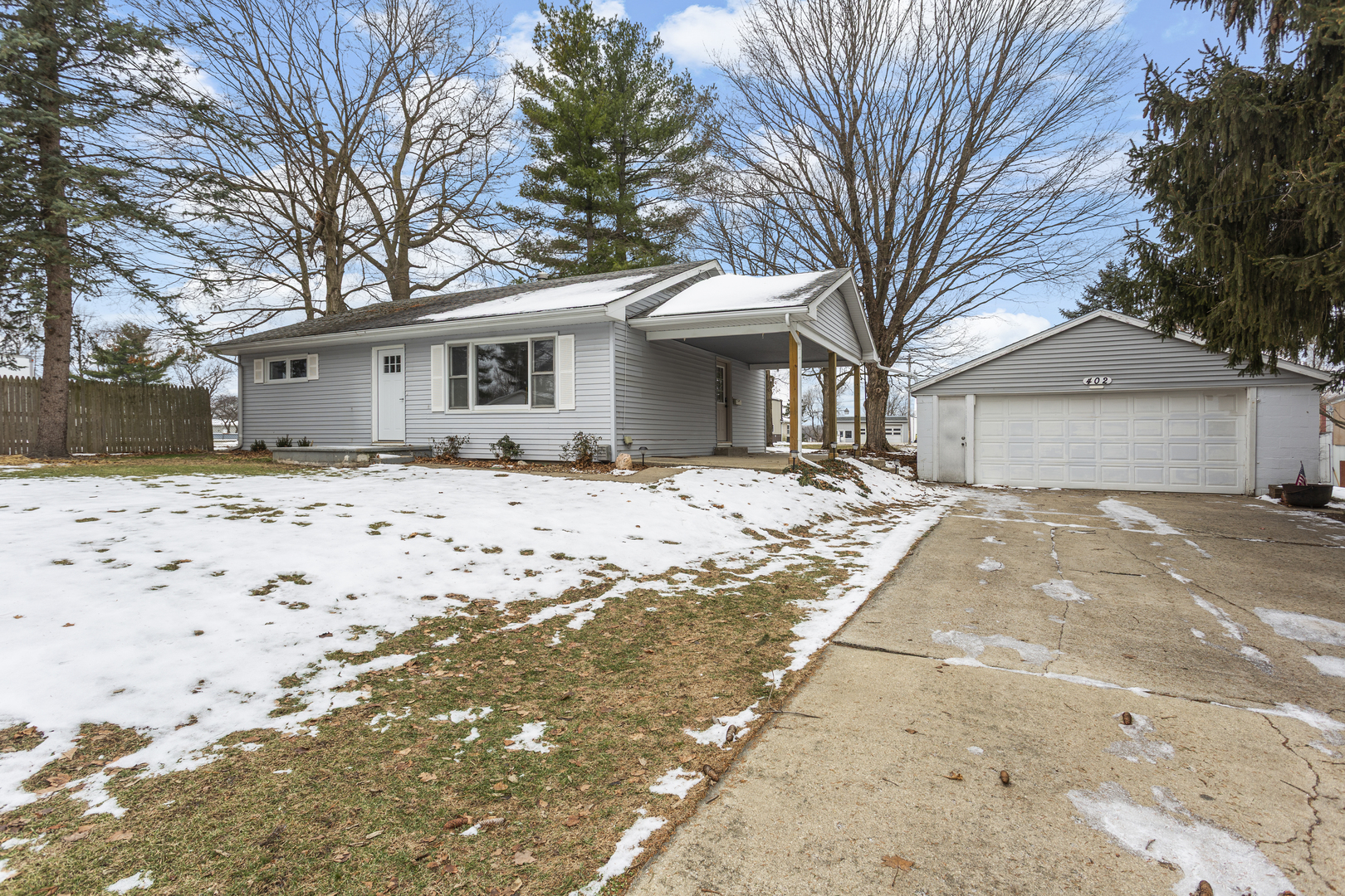 402 South Washington Street Saybrook, IL 61770 - Photo 2 of 24 a front view of house with yard covered in front of house
