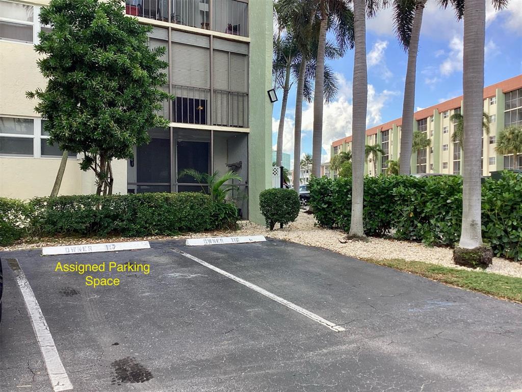5300 Northeast 24th Terrace, Unit 416C Fort Lauderdale, FL 33308 - Photo 24 of 26 a view of a street with a building in the background